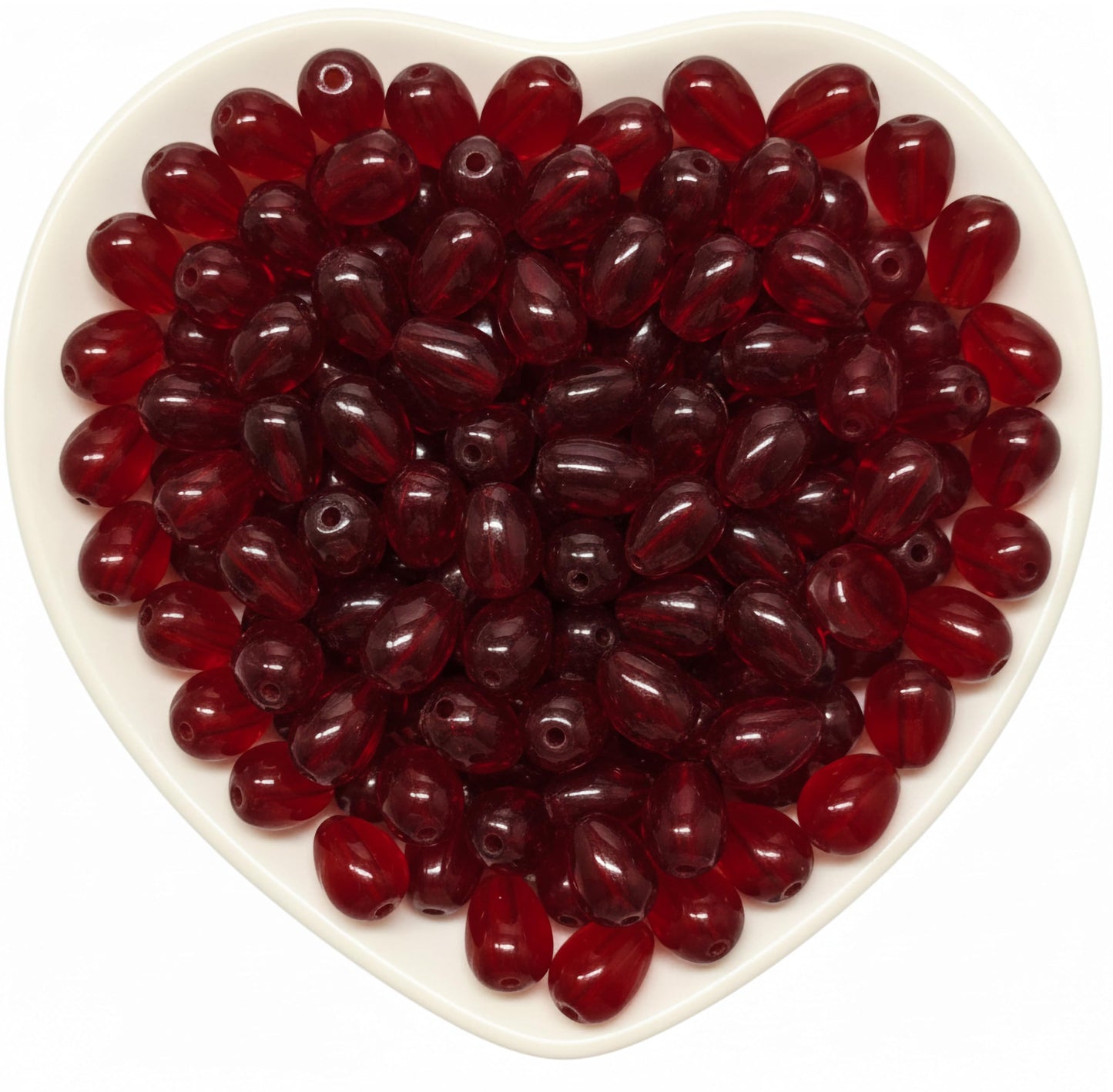 Use 10x6mm dark red glass beads to add dainty movement to necklaces, anklets and craft designs.