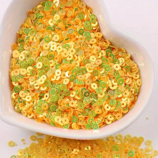 Dark yellow 4mm sequins round shape 4mm sitara sequins with holes fit into Embroidery for embroidery, craft decoration and fabric embellishment without making the design feel heavy.