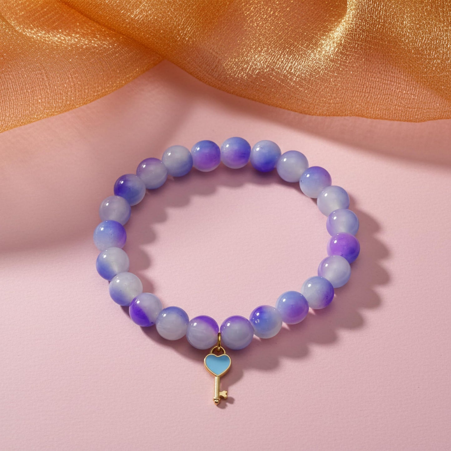 Bring color-block charm to casual outfits with a purple stretch bracelet for girls and women.