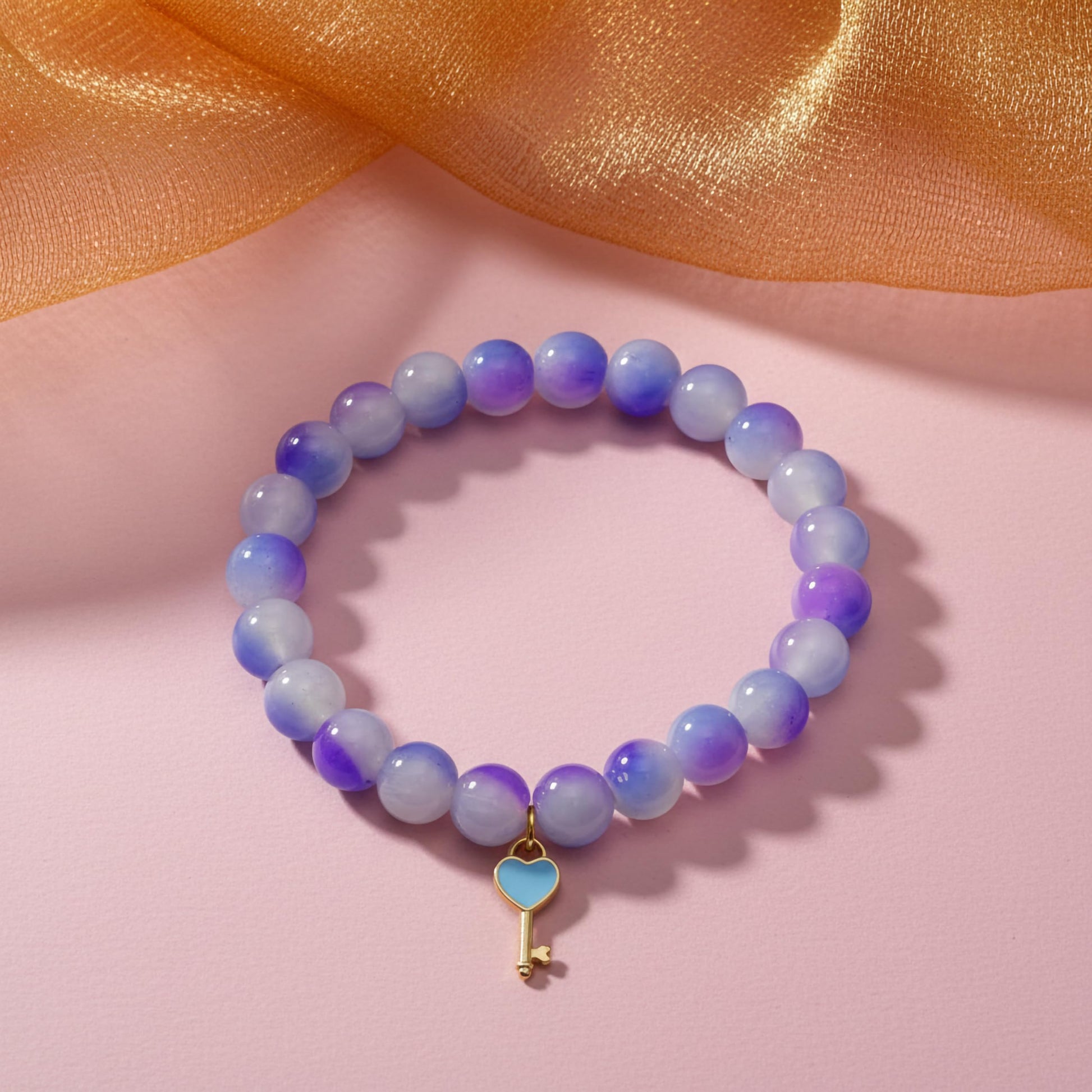 Bring color-block charm to casual outfits with a purple stretch bracelet for girls and women.