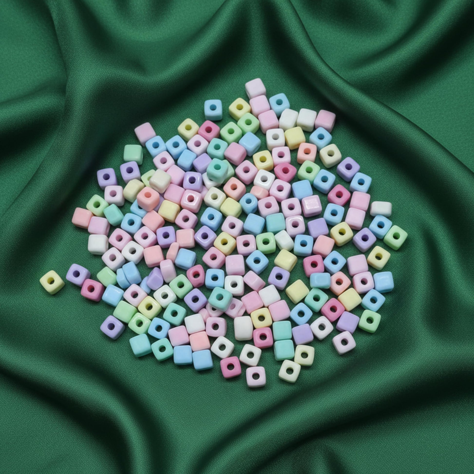 Make craft projects feel bright and organized with pastel square beads for jewelry and accessories.