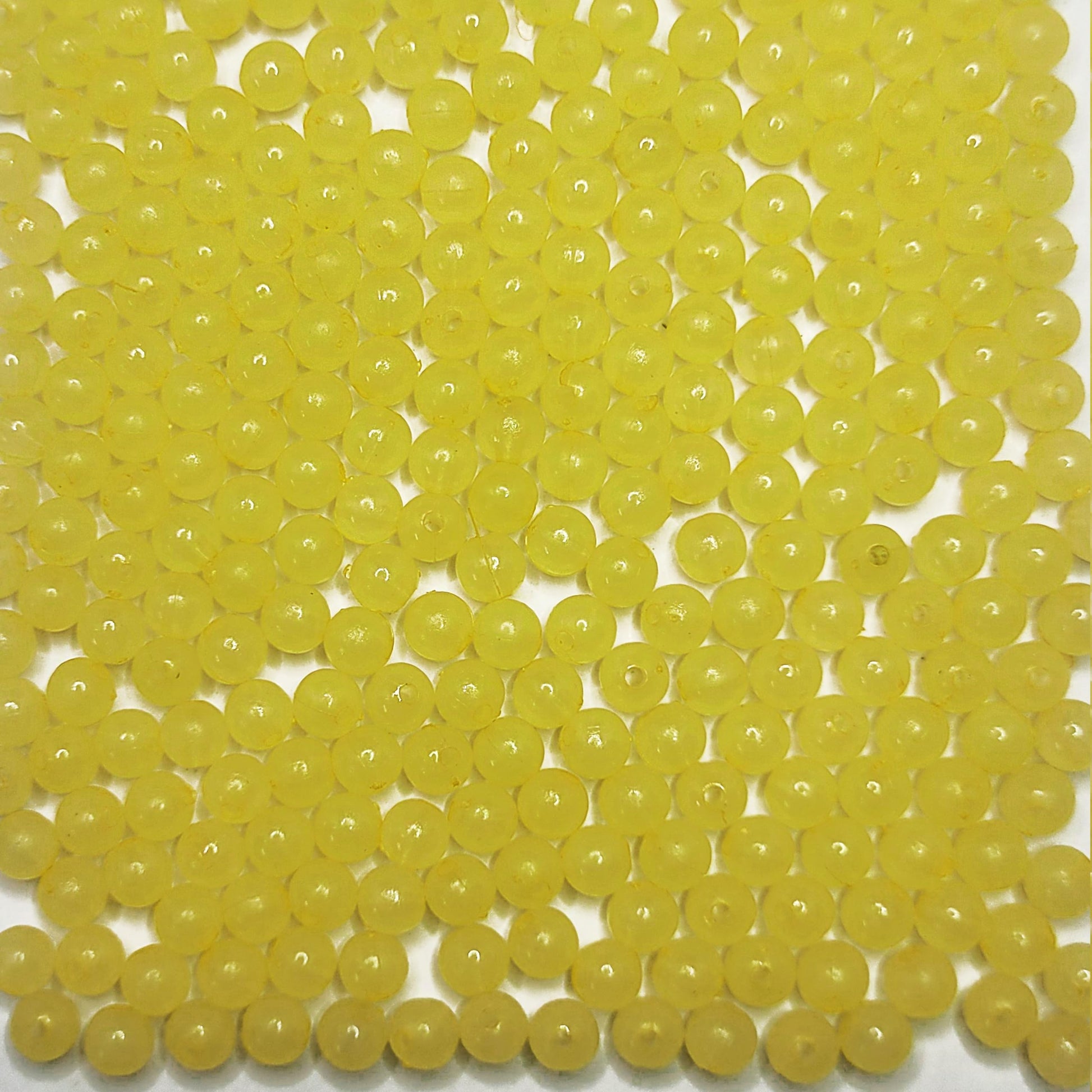 Clean decorative look comes through clearly in yellow and multicolour 6mm beads for bracelet making, necklace making and DIY jewellery projects.