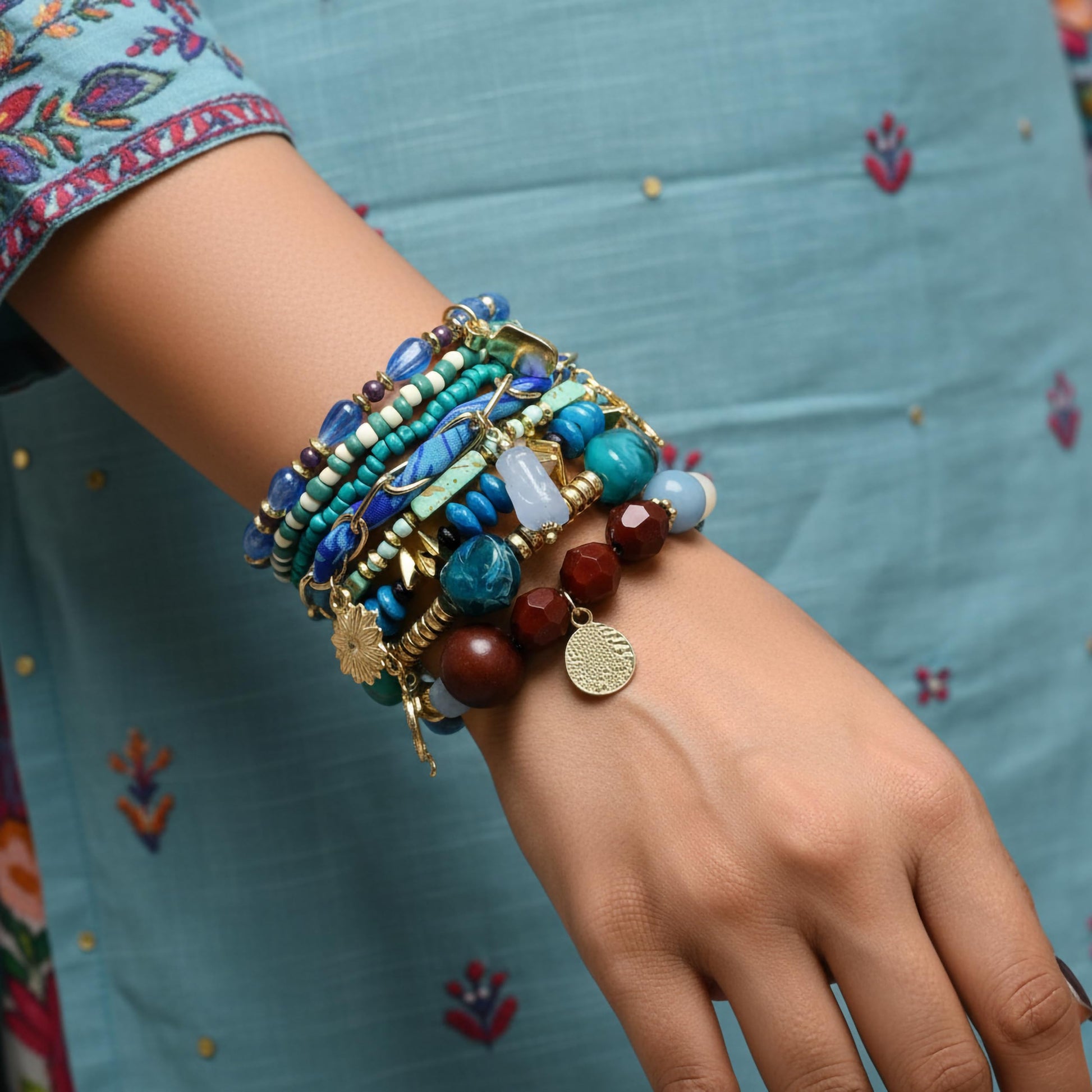 Make daily outfits feel more playful with a sky blue boho bracelet set and beachy accents.
