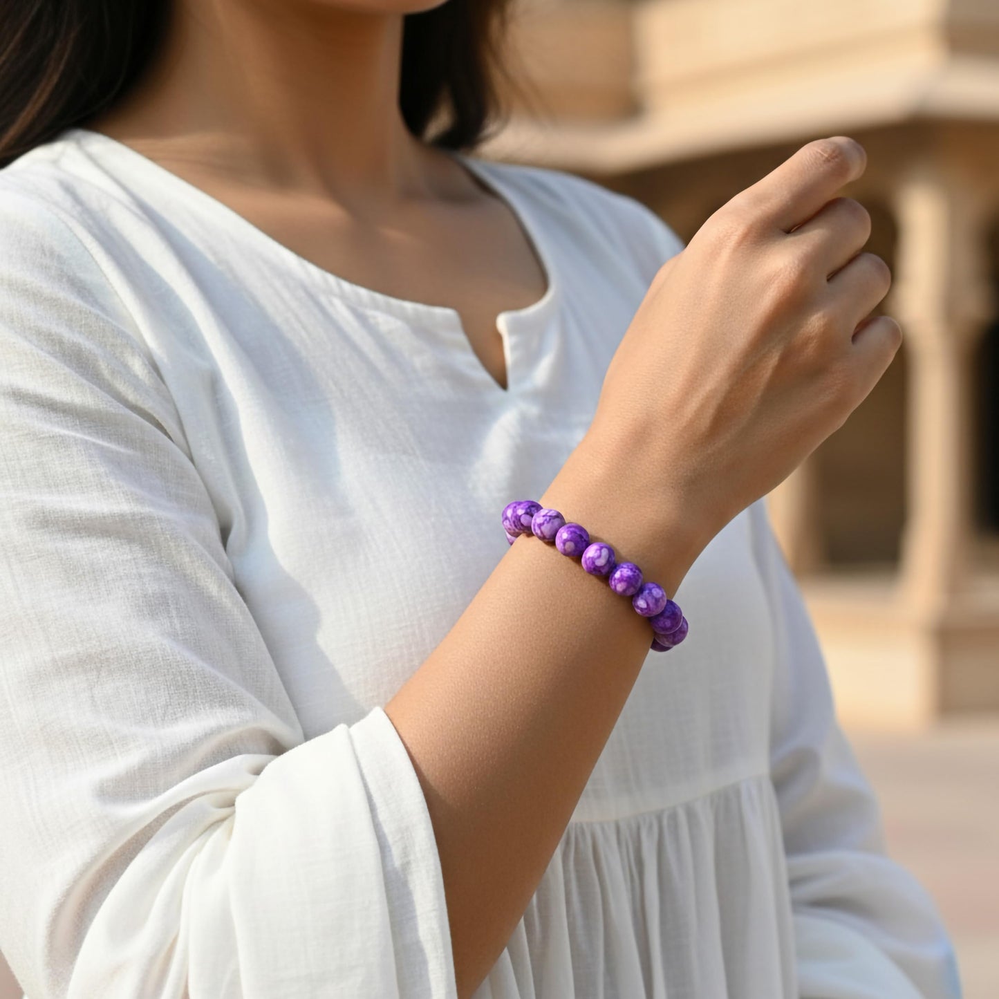 Style everyday outfits with a purple bead bracelet that feels cute, light and easy to layer.