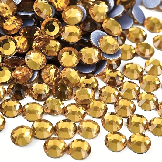 Light yellow 5mm and multicolour 4mm, 5mm, 6mm rhinestones and flatback stones help add a sparkling look to embellishment work, Lippan art and fabric decoration.