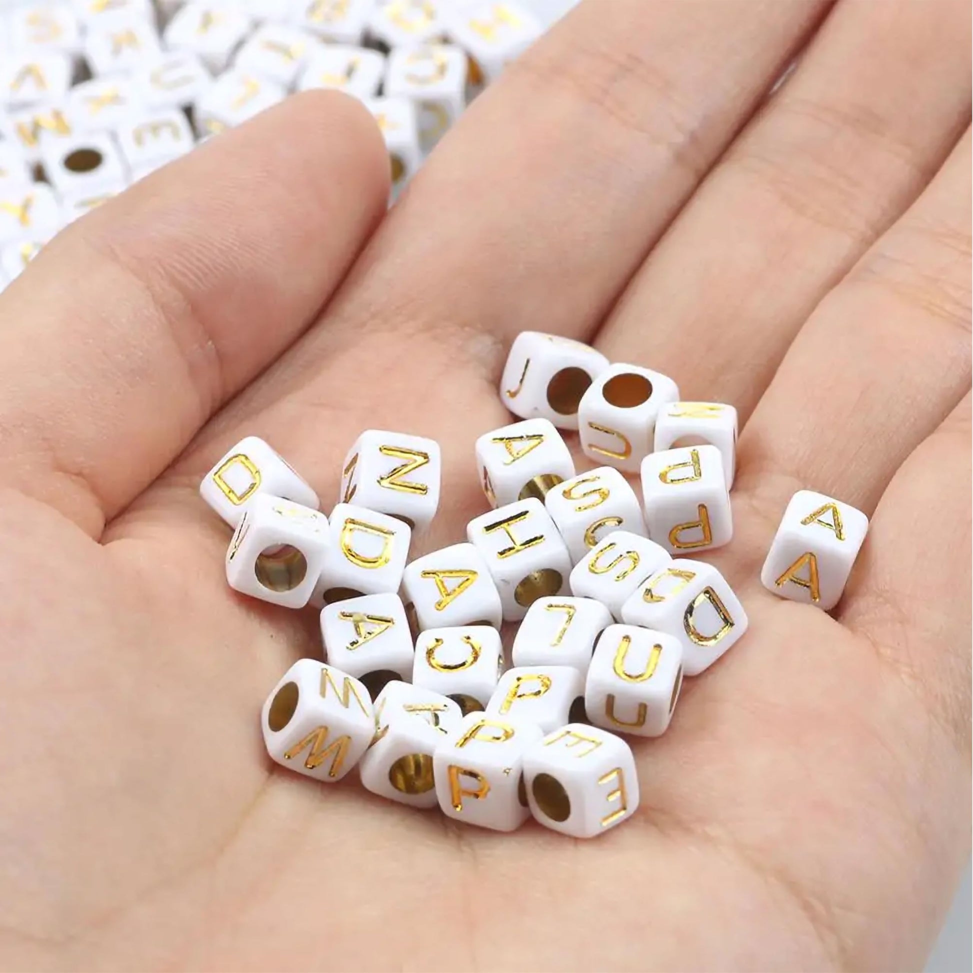 Gold white 6 mm and 6mm beads help add a neat decorative finish to DIY jewellery projects, beading craft and decorative craft finishing.