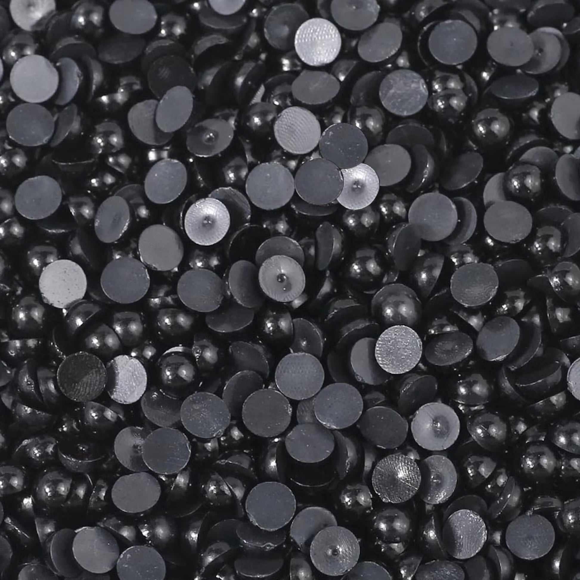 Let smooth black glue-on pearl cabochons add elegant craft accent to jewelry decoration and resin craft.