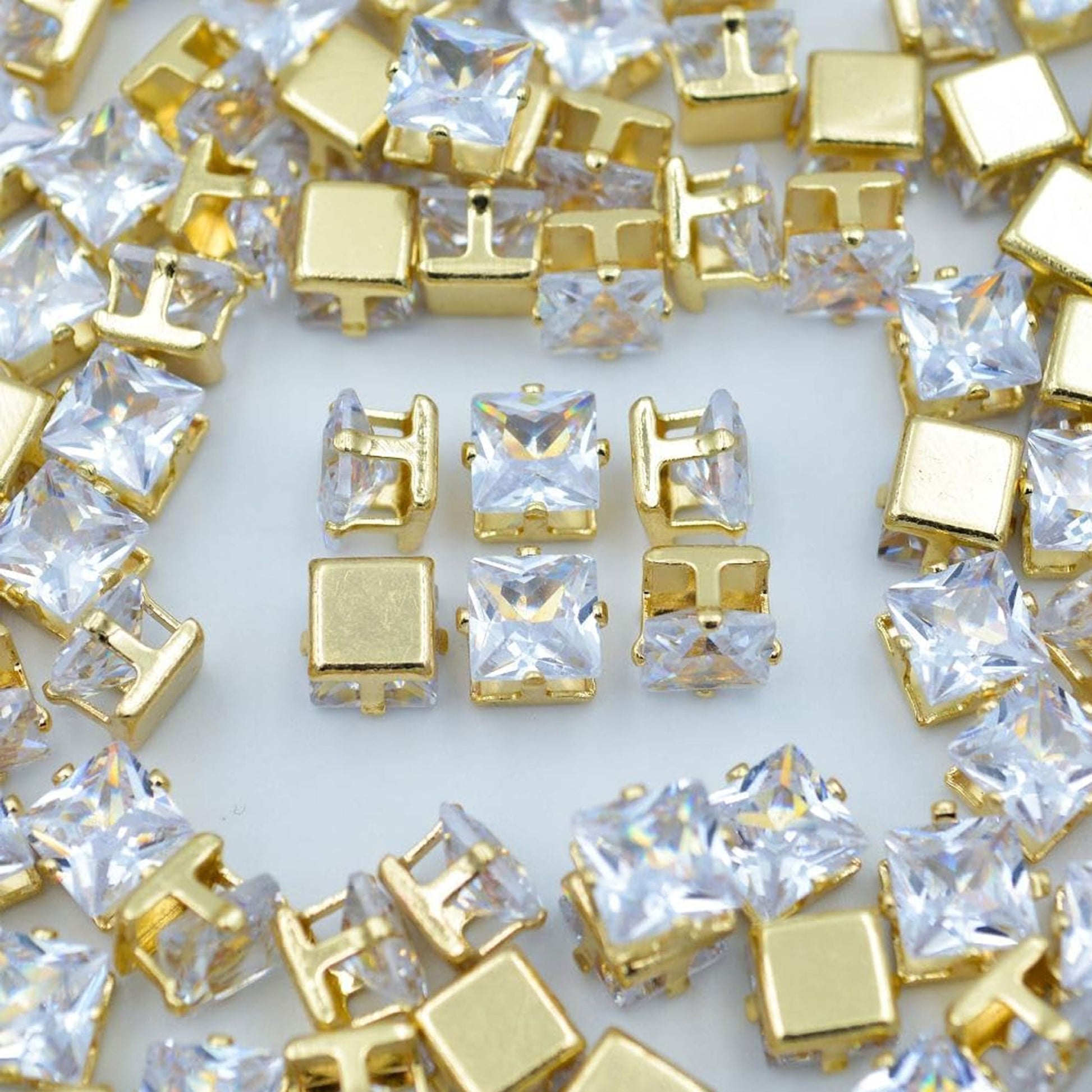 Square 6x6 and multicolour rhinestone and stone rhinestones and flatback stones add useful detail to embellishment work, Lippan art and fabric decoration.