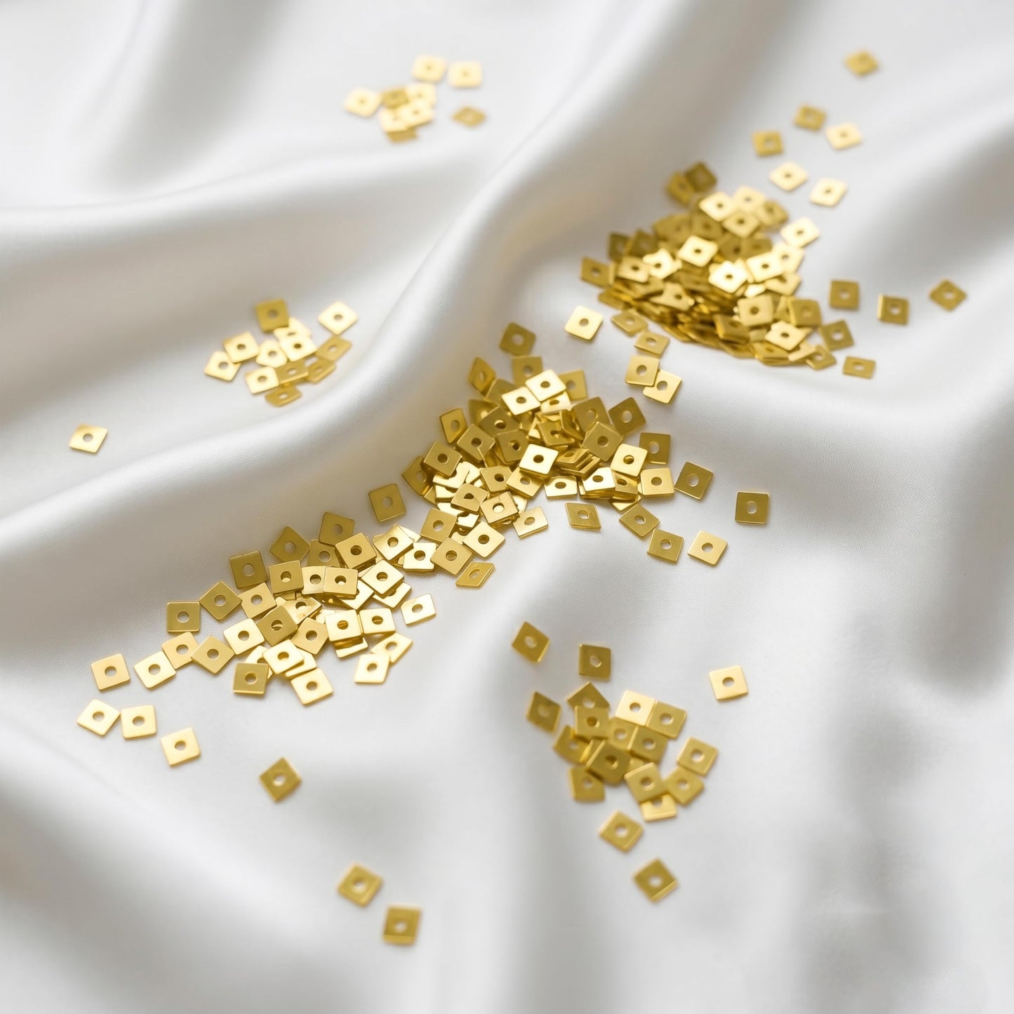 Create a neat finish in dress decoration and boutique craft projects with 3mm gold dress craft sequins.
