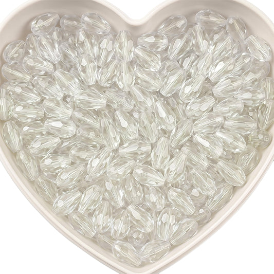 Add graceful dangle accents to earrings and charms with 15x10mm white faceted teardrop beads.