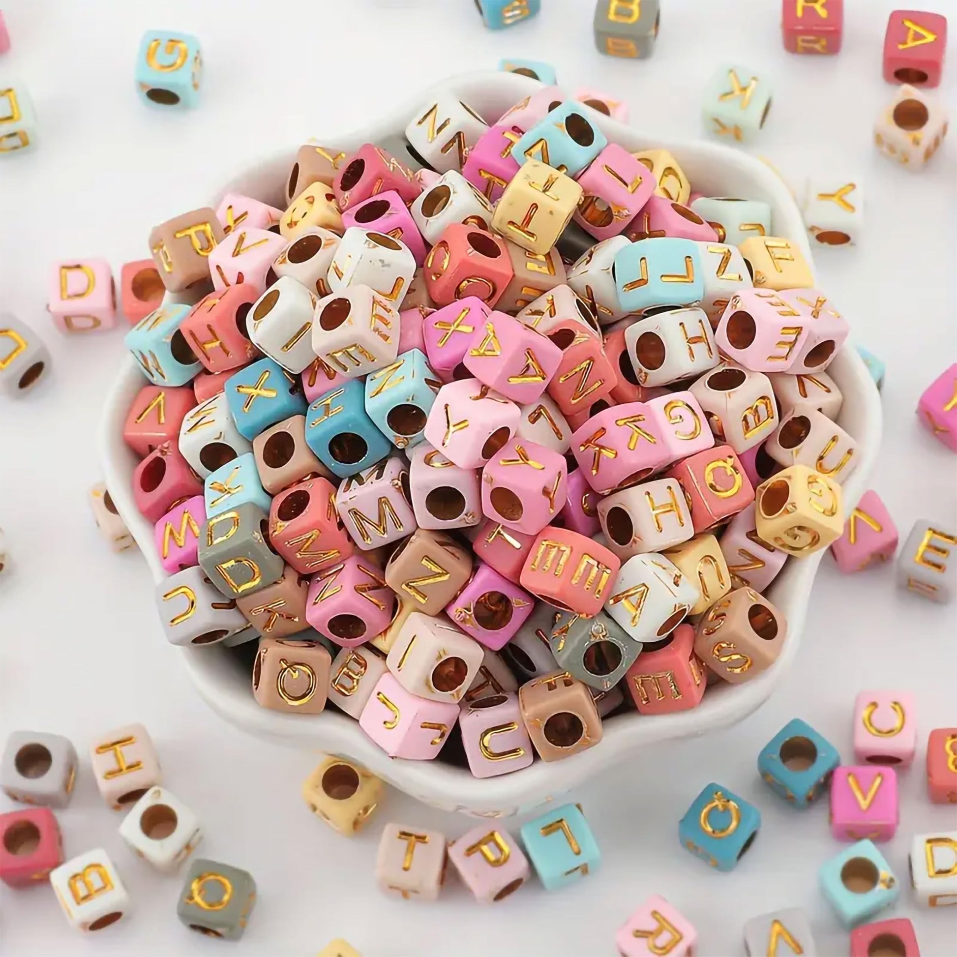 Gold Multicolor Alphabet Letter Cube 6mm. Close-up image showing product details and finish.