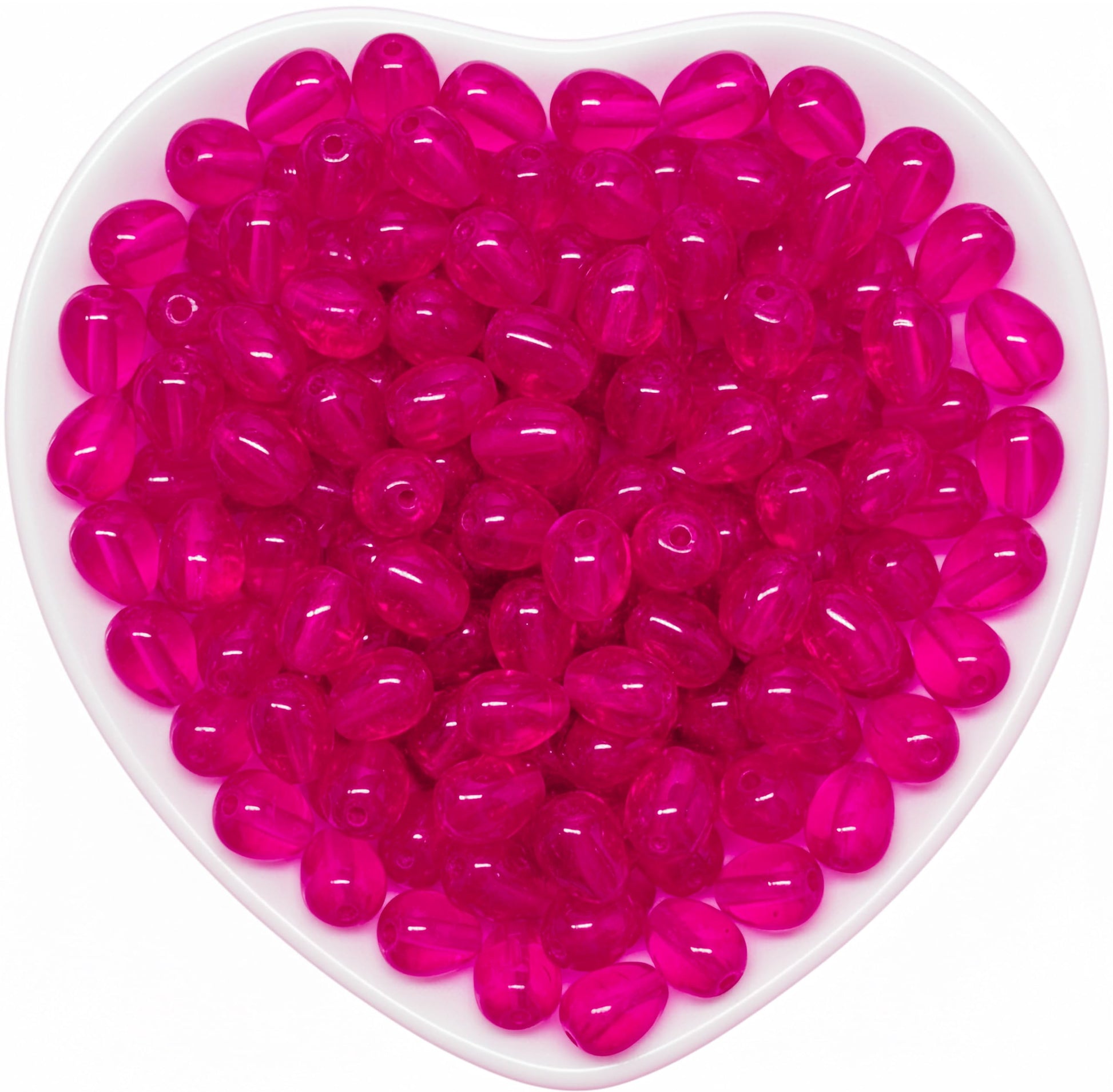 Add glossy teardrop accents to bracelets and earrings with 10x6mm magenta glass beads.