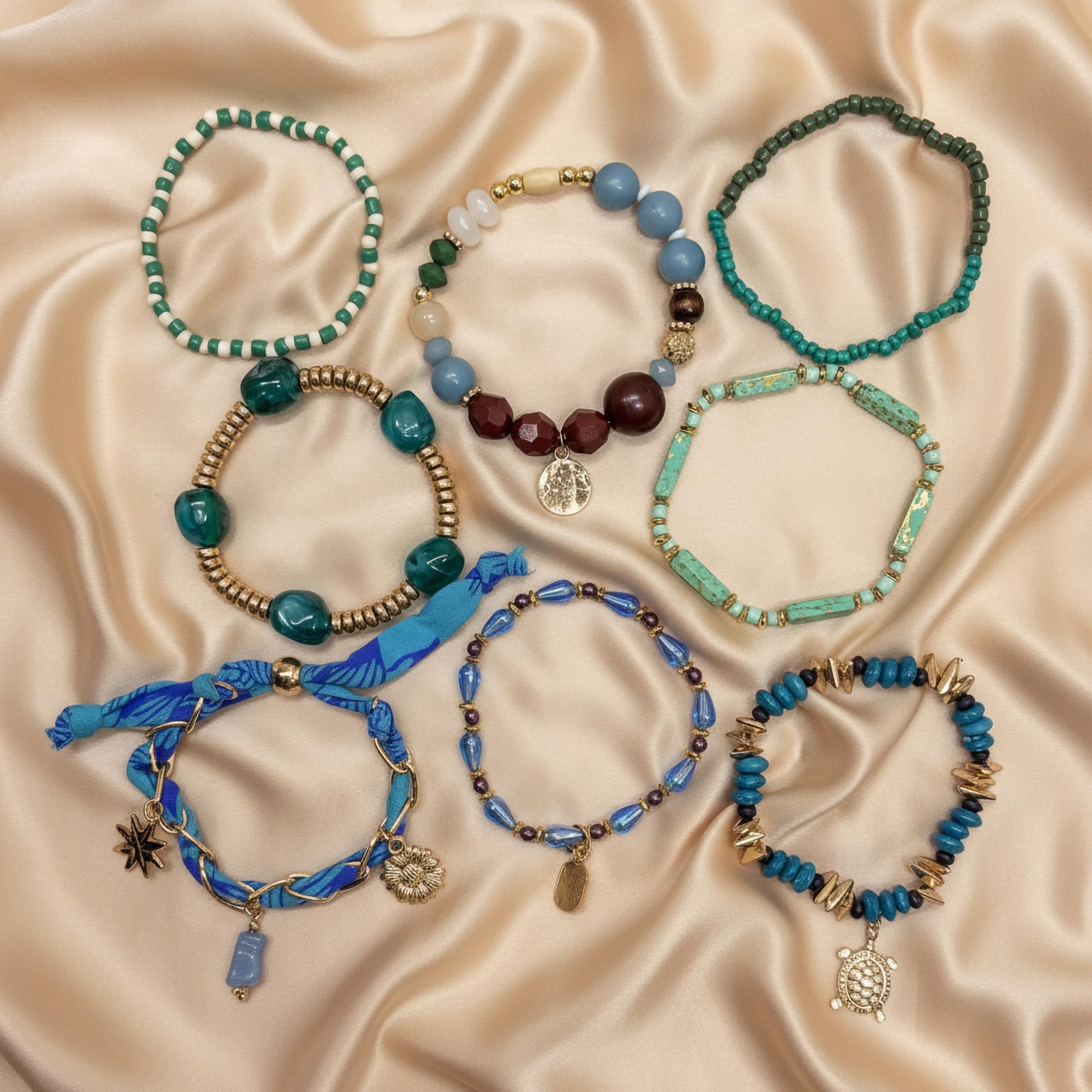 Gift an easy coastal accessory with a sky blue beaded shell bracelet set for women.