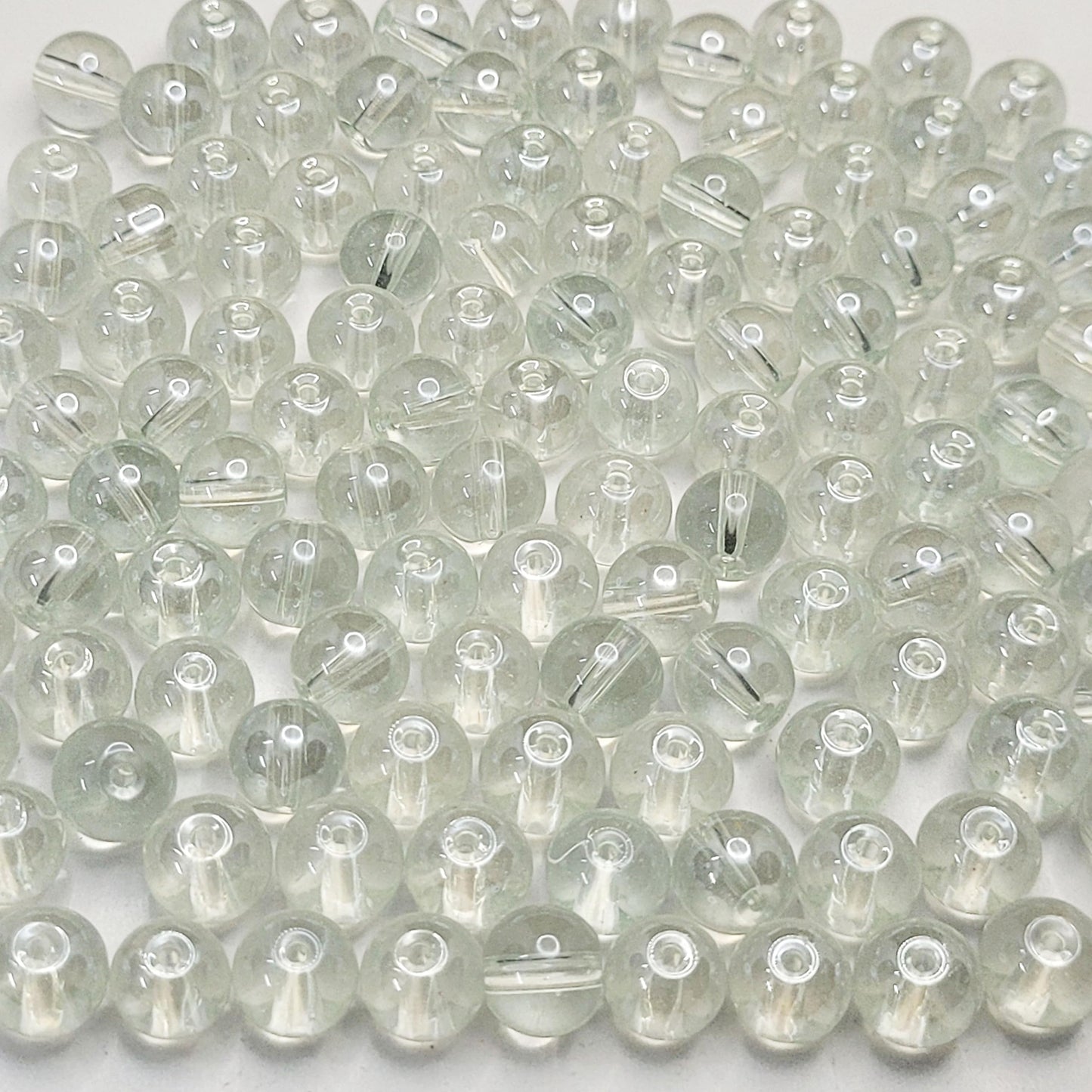 In bracelet making, necklace making and DIY jewellery projects, transparent and multicolour 8mm beads add depth and neat finishing.