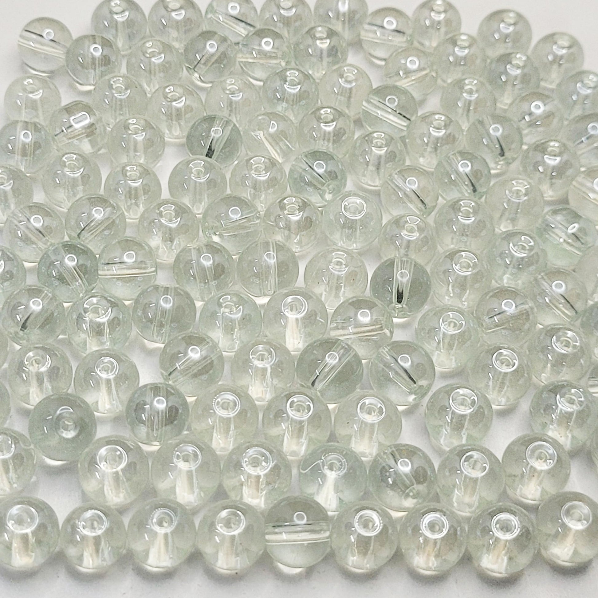 In bracelet making, necklace making and DIY jewellery projects, transparent and multicolour 8mm beads add depth and neat finishing.