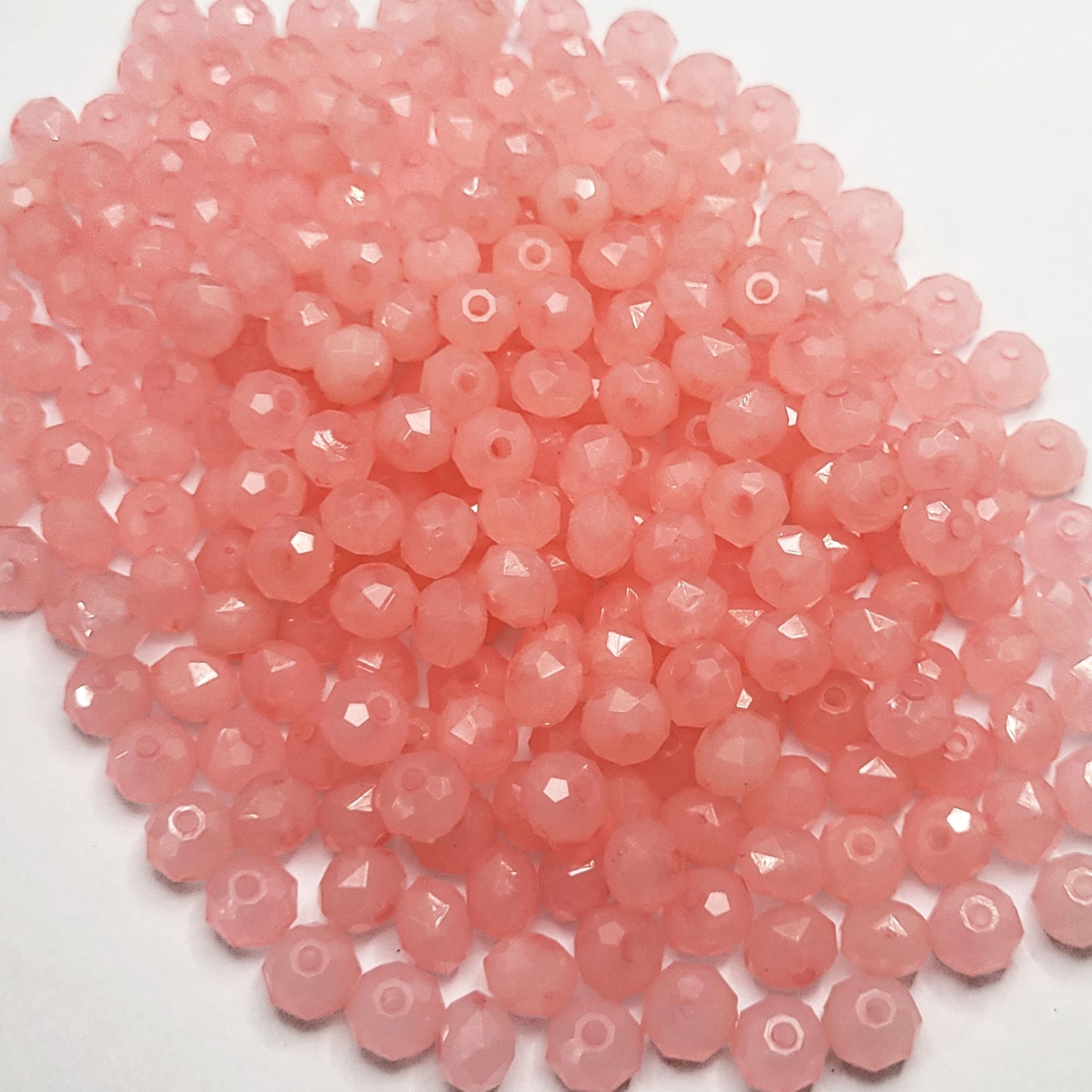 The clean decorative look of pink 8mm beads supports bracelet making, necklace making and DIY jewellery projects.