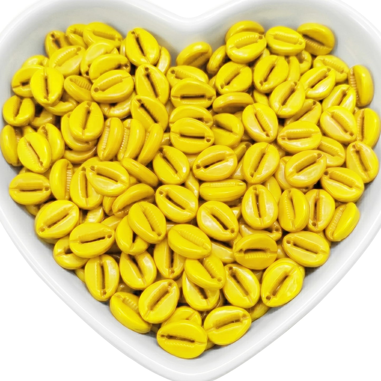 Give craft projects a sea-inspired finish with yellow cowrie shell beads for jewelry making.