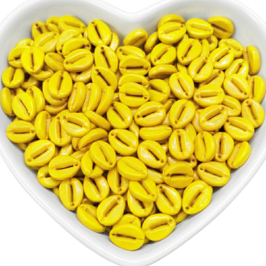Give craft projects a sea-inspired finish with yellow cowrie shell beads for jewelry making.
