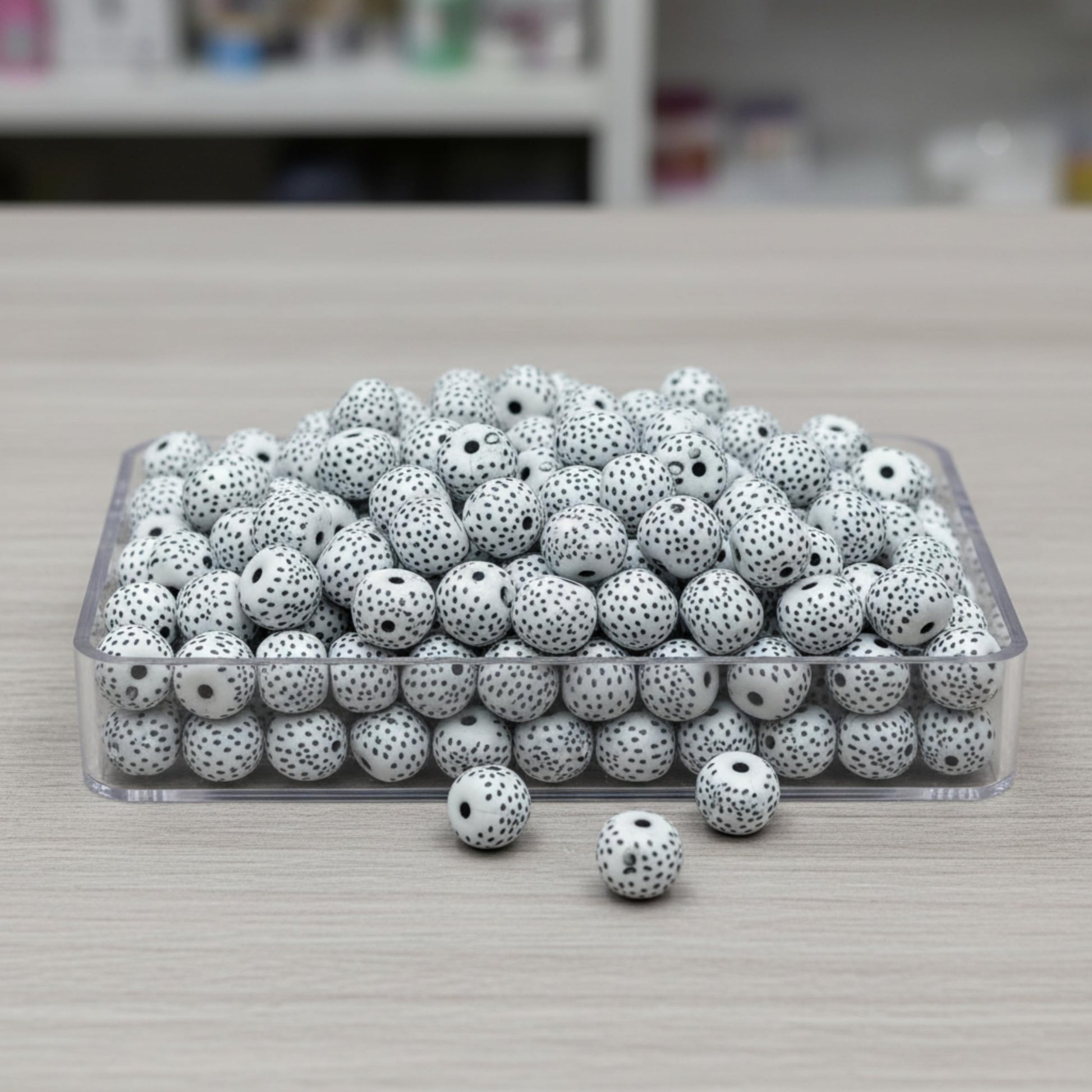 Jewelry making beads with dotted pattern in black and white