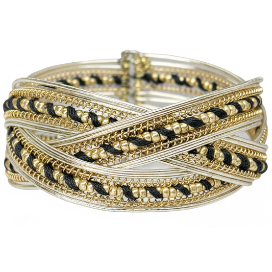 Gold and black criss cross beaded cuff statement bracelet.