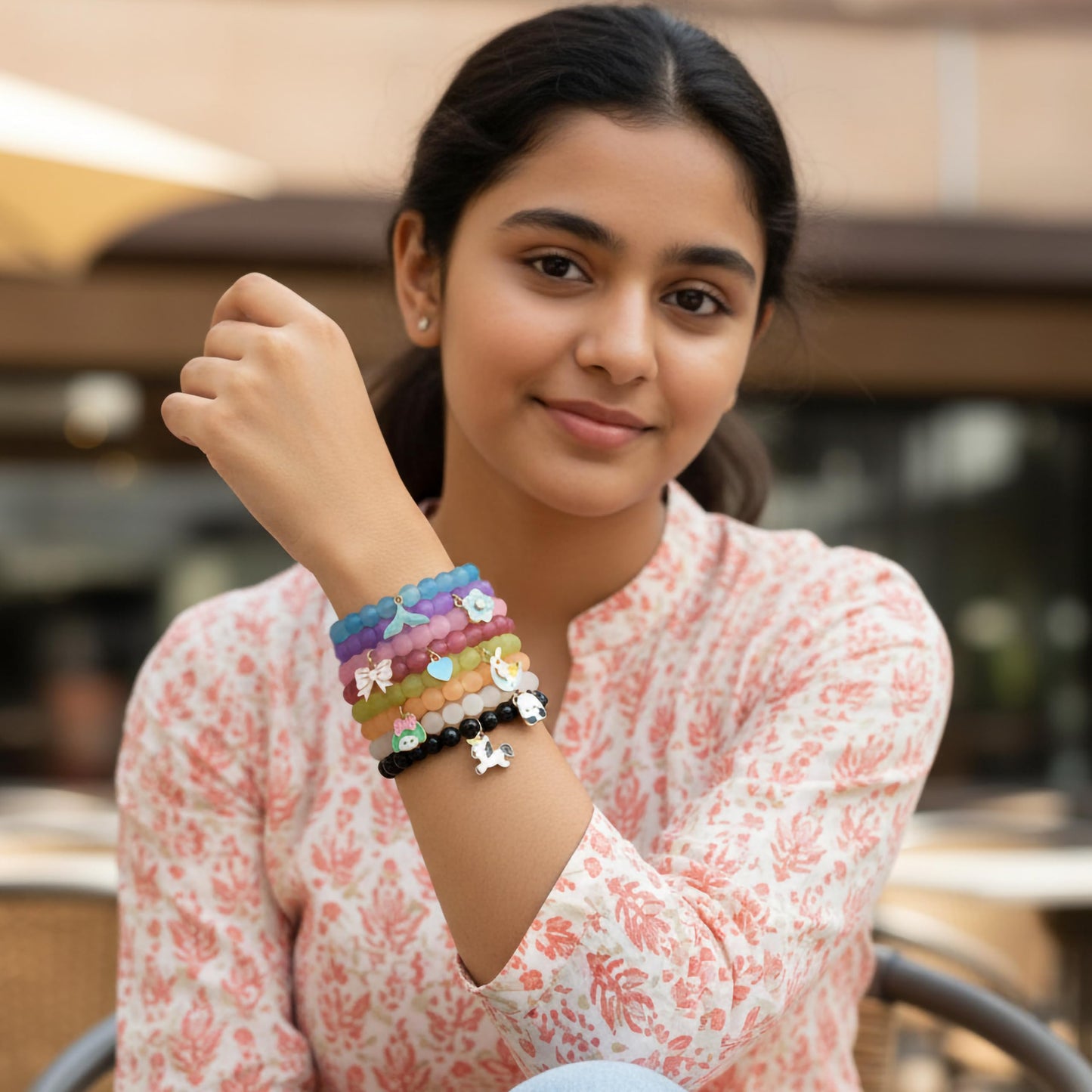 Create easy everyday accessory looks with an 8-piece stretch bracelet set featuring glossy beads.