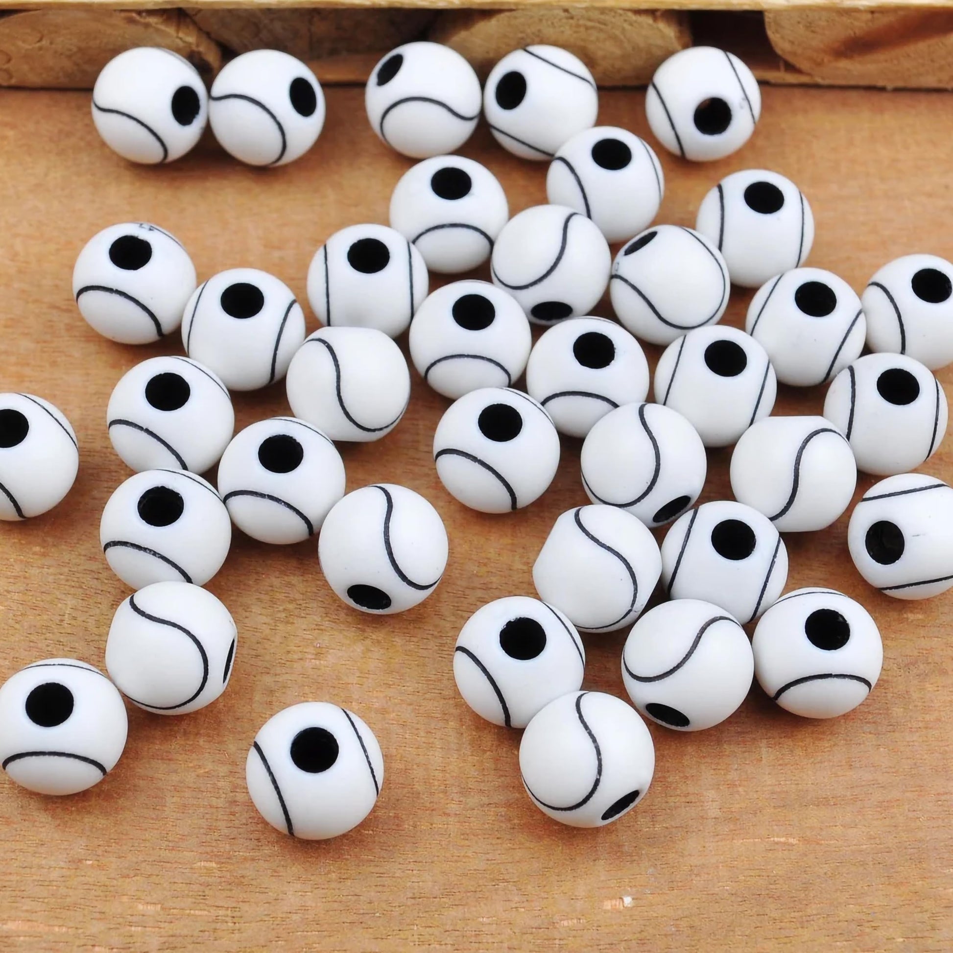 Black  wave pattern beads on white base for jewelry making