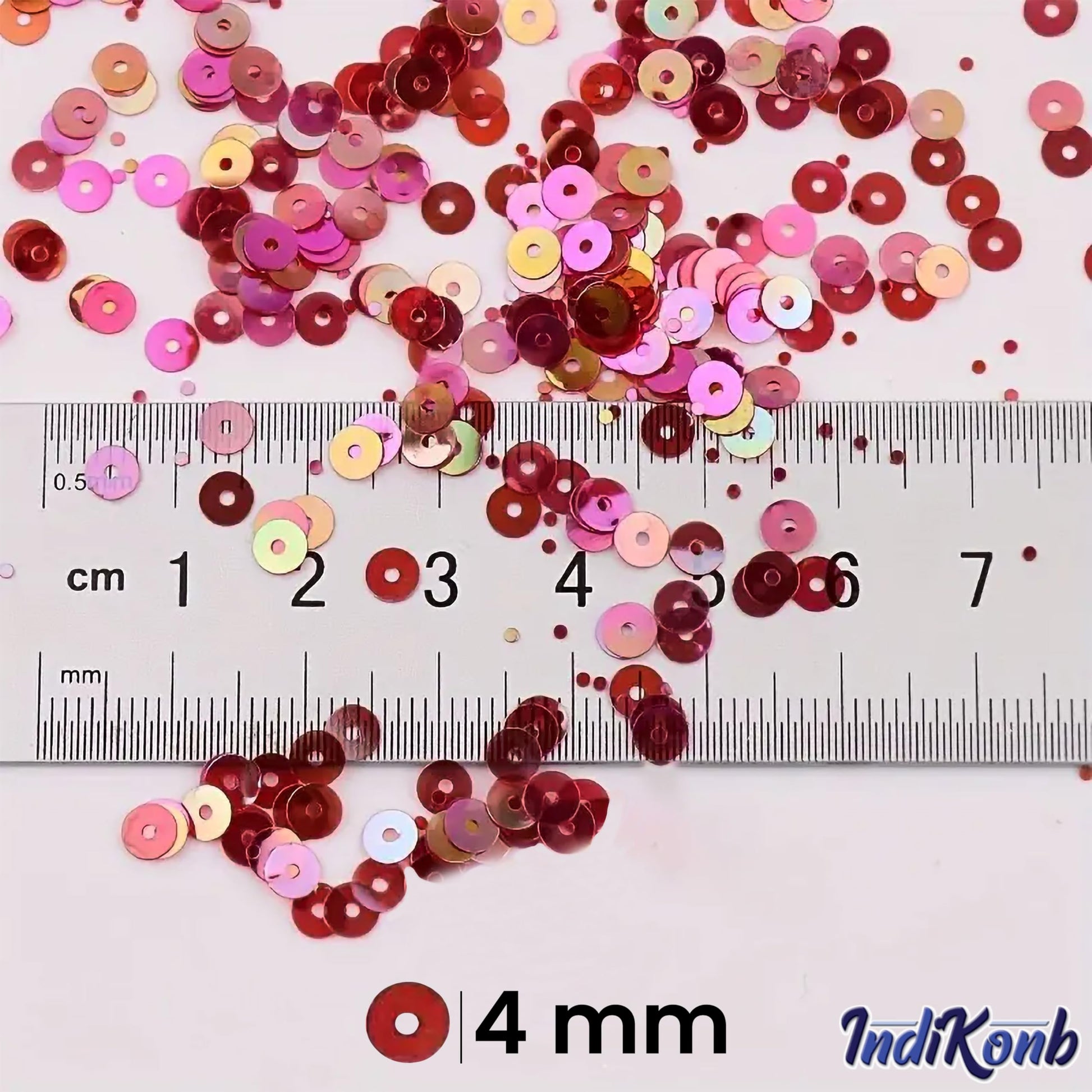To add a decorative embroidery, place pink 4mm sequins round shape 4mm sitara sequins with holes for embroidery into craft decoration and fabric embellishment.