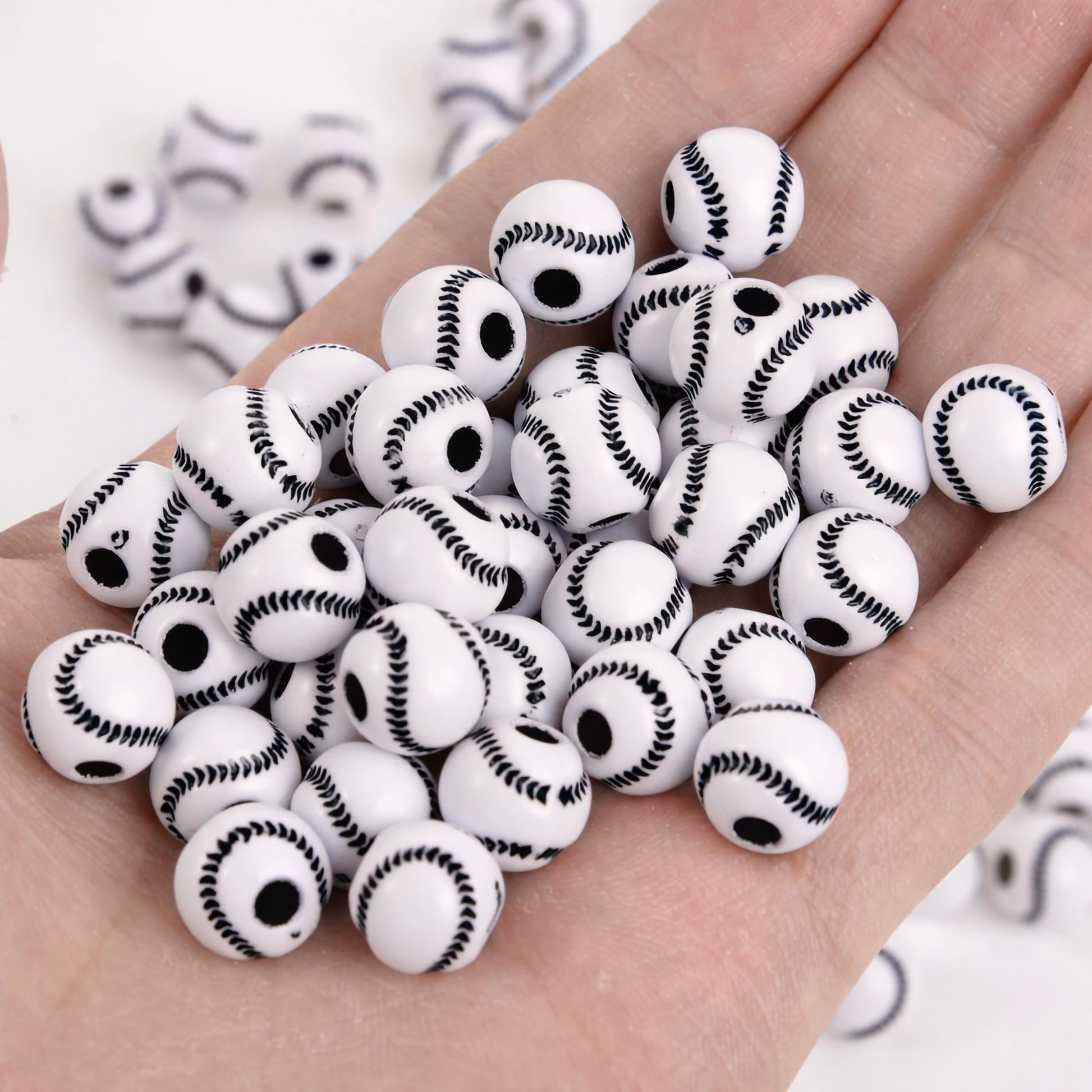 Decorative sports beads with baseball pattern in white