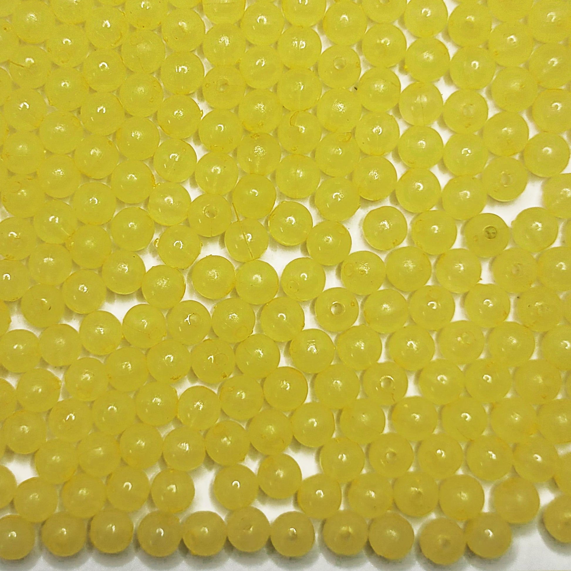 A refined detail for bracelet making, necklace making and DIY jewellery projects, yellow and multicolour 8mm beads add a clean decorative look with yellow detail.