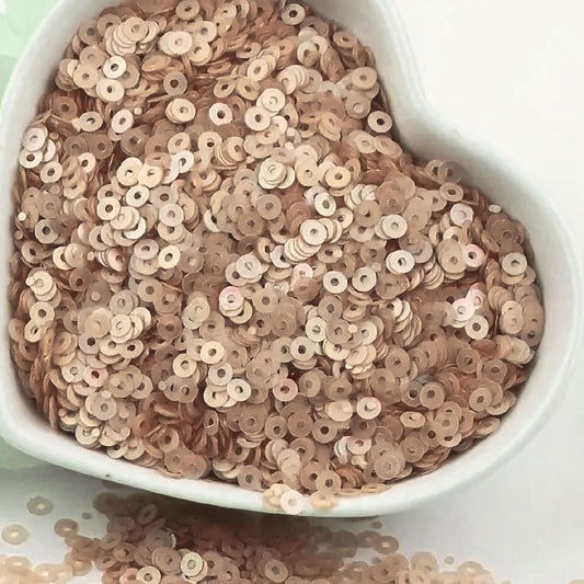Light brown 4mm sequins round shape 4mm sitara sequins with holes make Embroidery for embroidery, craft decoration and fabric embellishment look more complete.