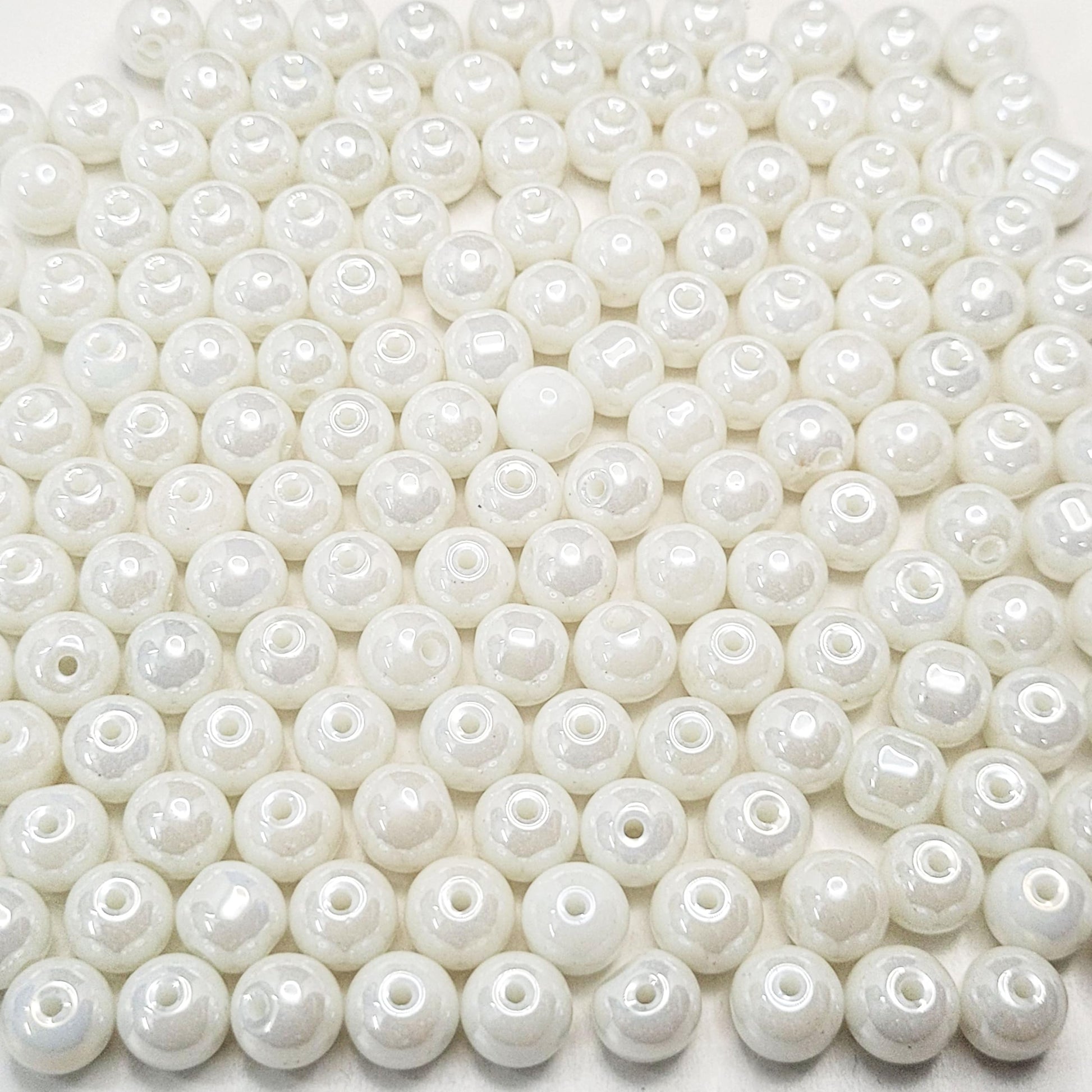 Use white and multicolour 8mm beads to give bracelet making, necklace making and DIY jewellery projects a clean decorative look with white detail.