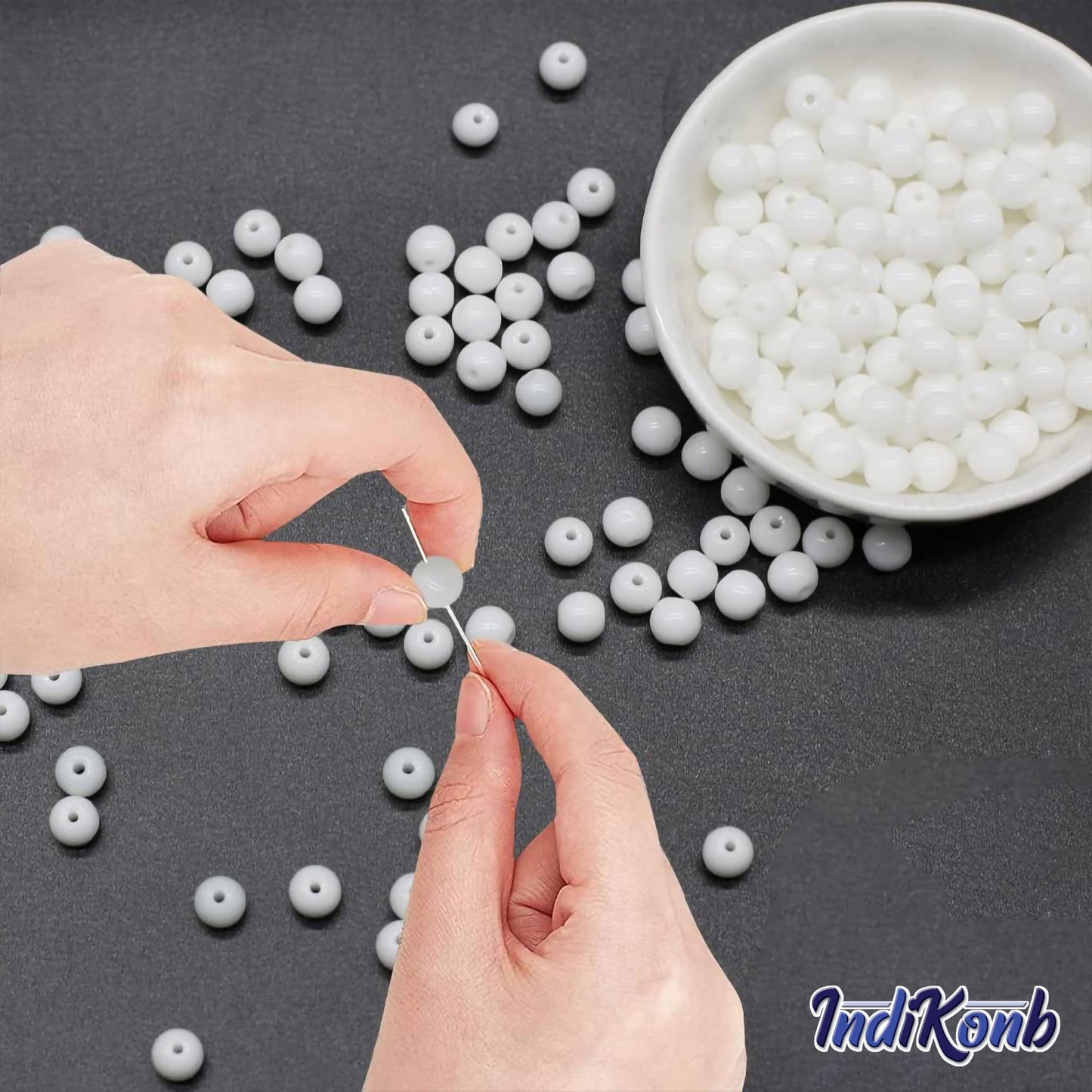 A handmade beadwork accent to handmade projects makes white and silver 6mm beads suitable for necklace making and DIY jewellery projects.