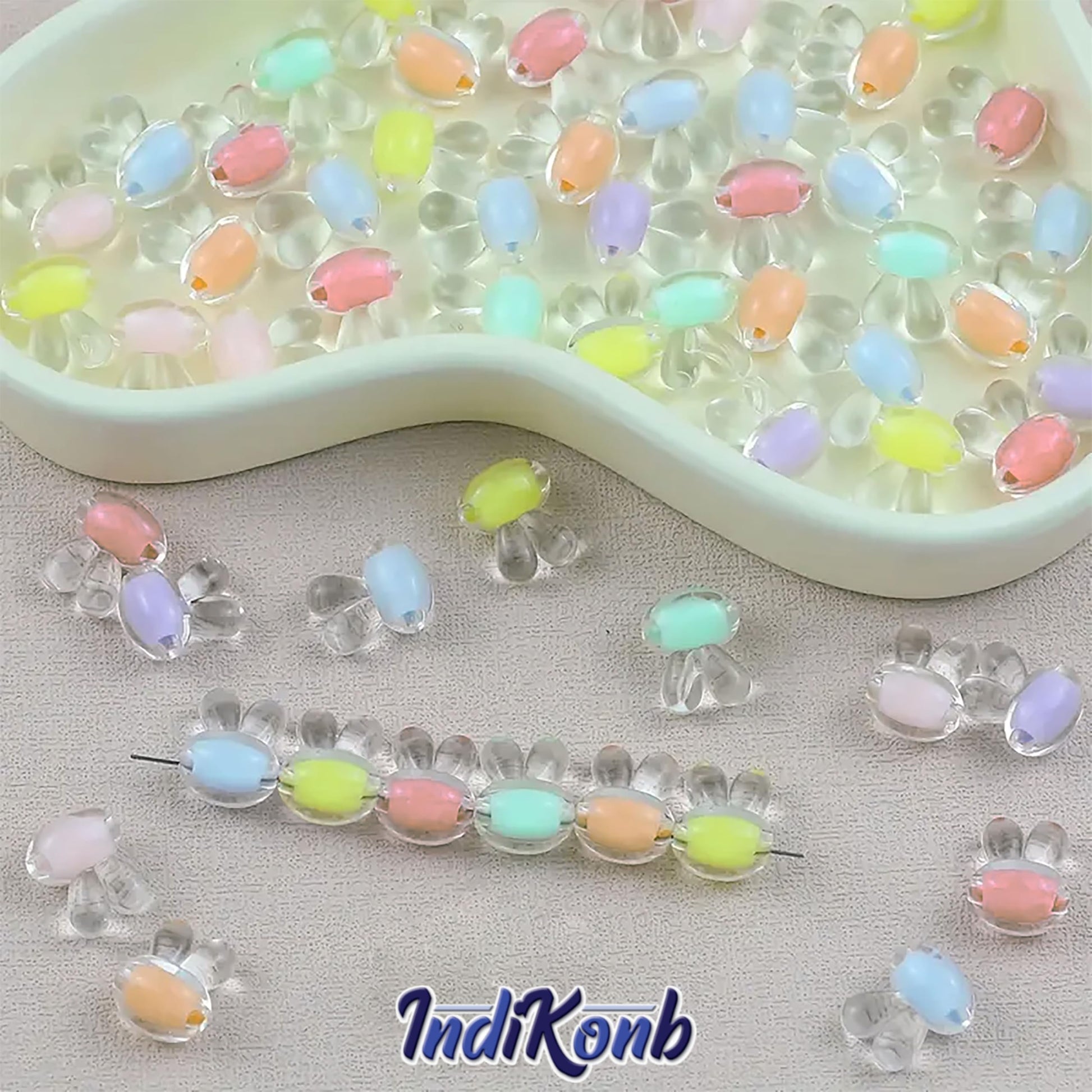 Rabbit beads and multicolour plastic and acrylic beads are a clean finishing element for bracelet making, necklace making and DIY jewellery projects.
