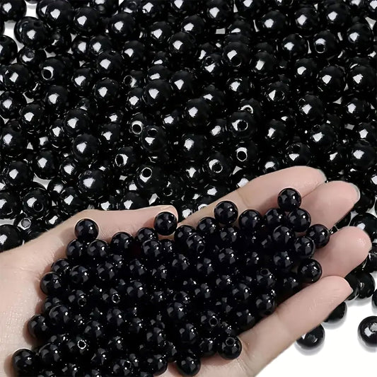 A balanced detail for bracelet making, necklace making and DIY jewellery projects, 10mm and black 10mm and 3mm beads offer a clean decorative look.