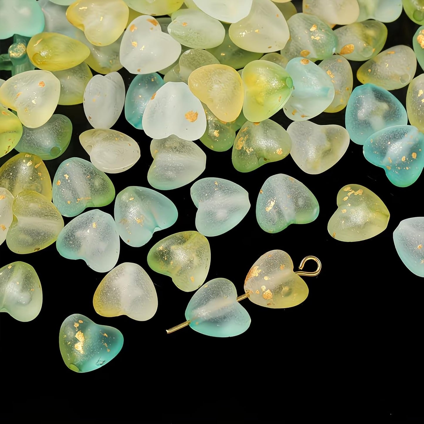 Make DIY jewelry feel complete with soft green foil frosted heart accents for cute accessory projects.