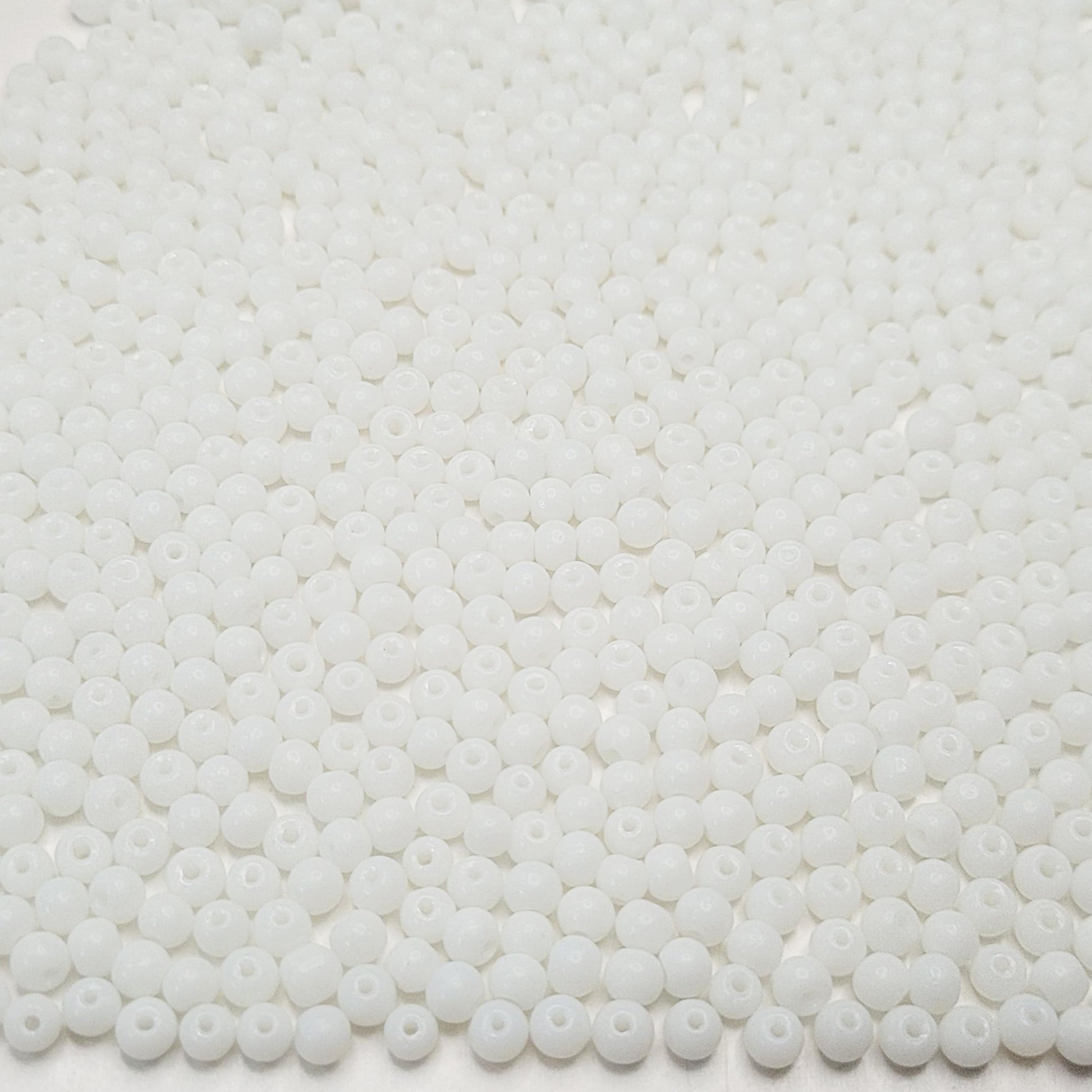 Clean decorative look comes through clearly in white and multicolour 4mm beads for bracelet making, necklace making and DIY jewellery projects.