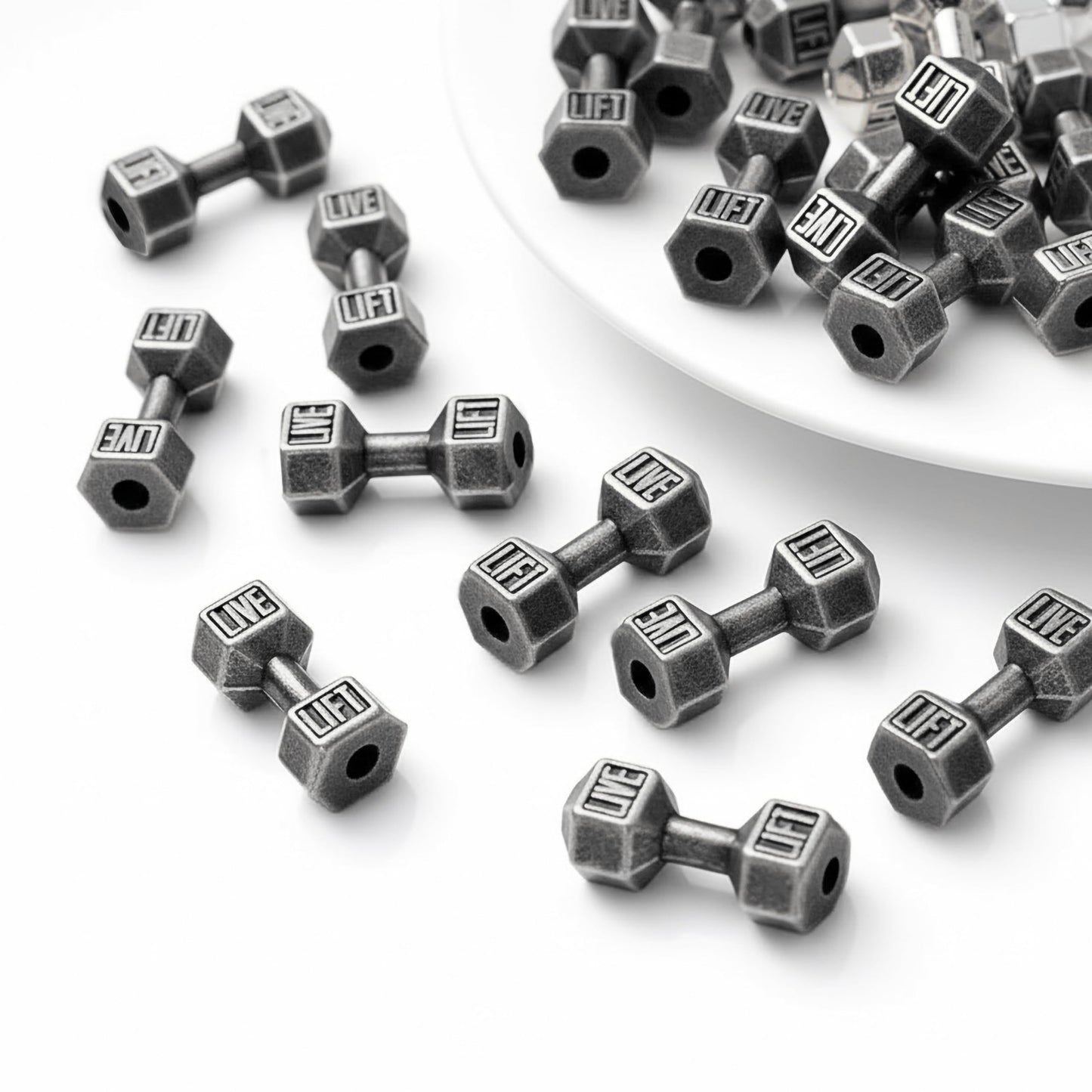 Silver tone gym charm pendants turn keychains into more expressive craft work.