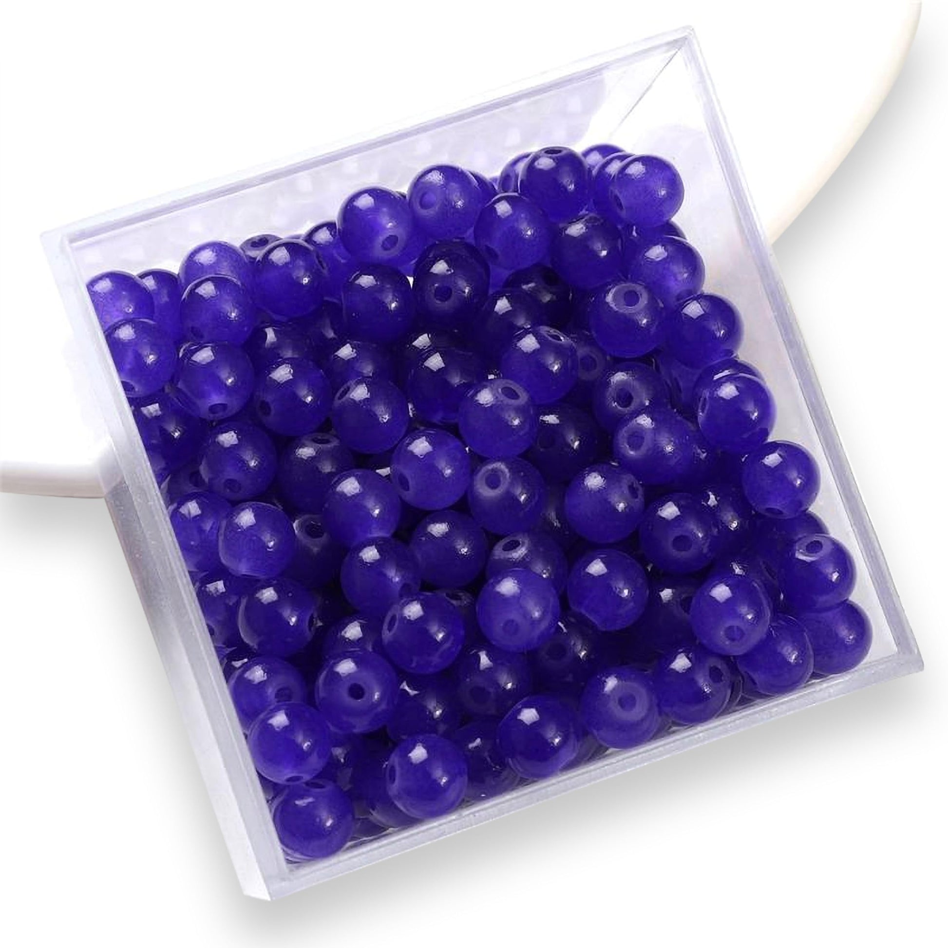 Dark blue and pearl 6 mm and 6mm beads work naturally in bracelet making, necklace making and DIY jewellery projects and help keep the design neat.