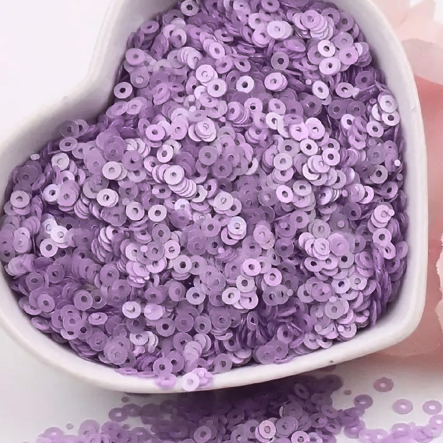 Light purple 4mm sequins round shape 4mm sitara sequins with holes for embroidery offer a neat decorative finish for fabric embellishment, card making and decorative craft.