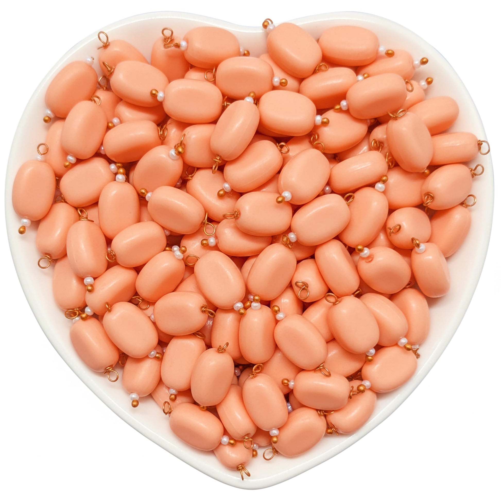 Show a clean craft look in traditional jewelry projects with 10x7mm peach smooth blouse latkan beads for blouse latkans.