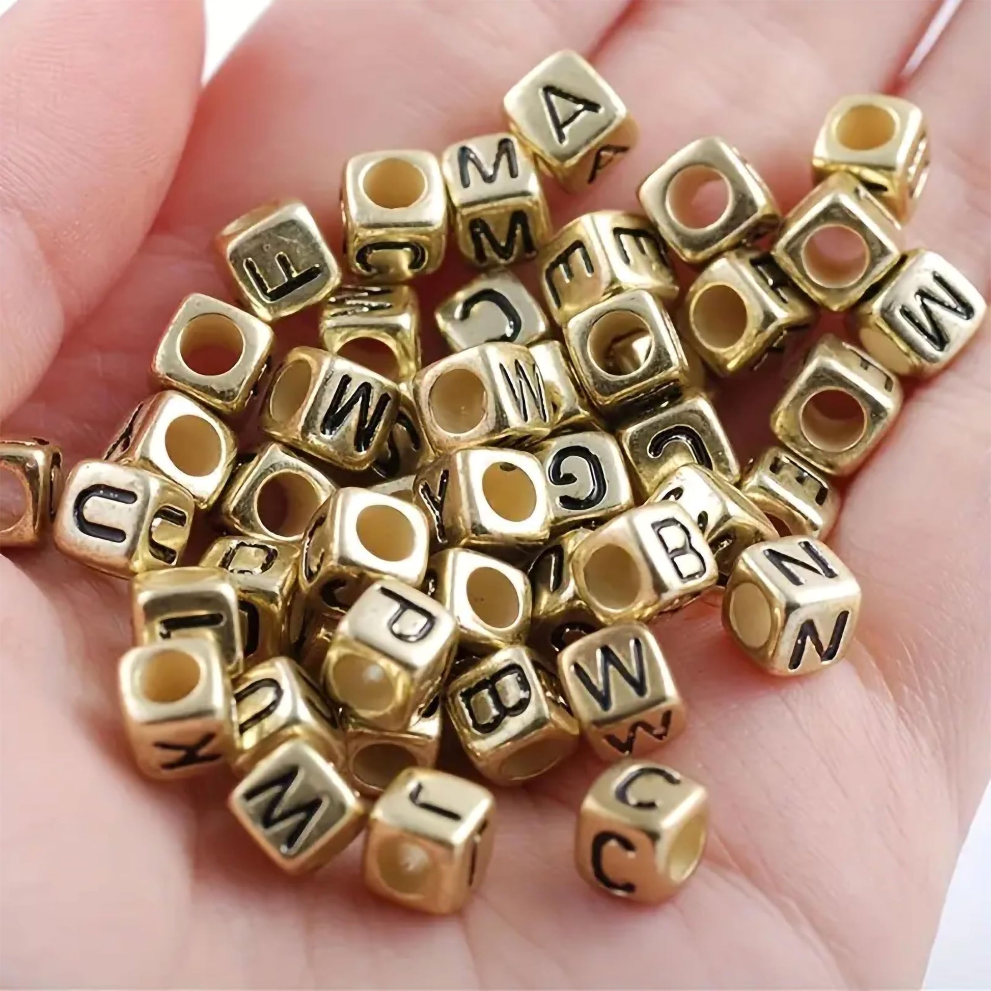 Gold black 6 mm and 6mm beads offer a handmade beadwork accent to handmade projects for necklace making and DIY jewellery projects.