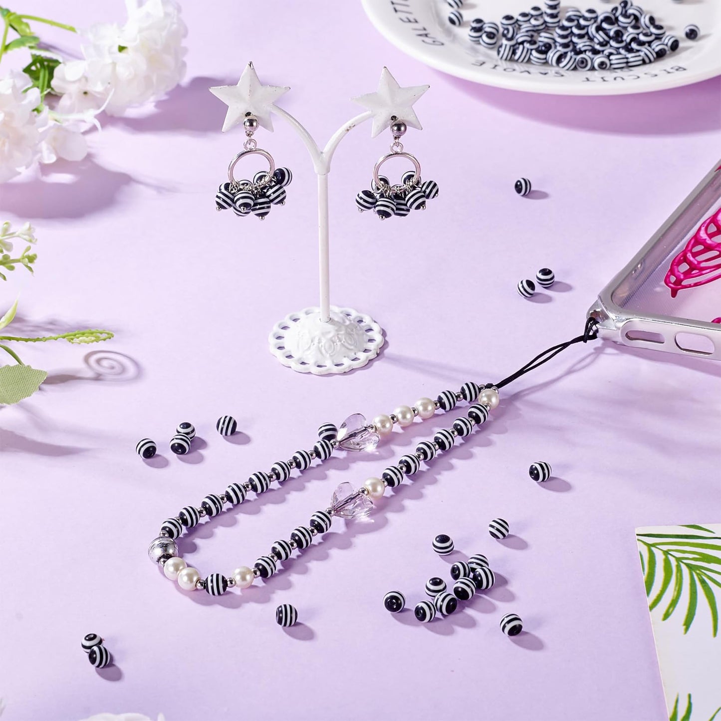 Round beads with stripe pattern in monochrome style