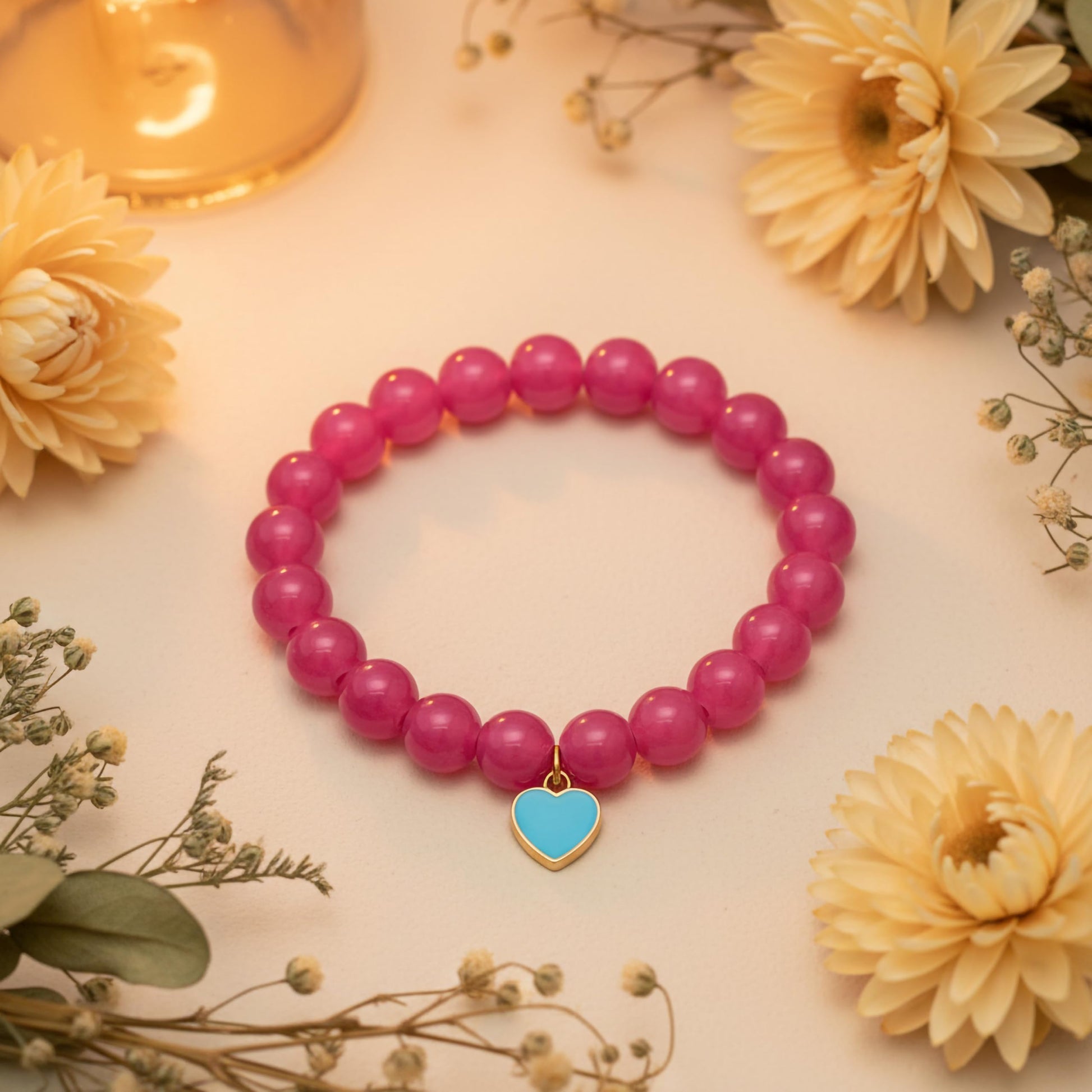 Gift a light and cheerful bracelet style with ruby beads and comfortable elastic wear.