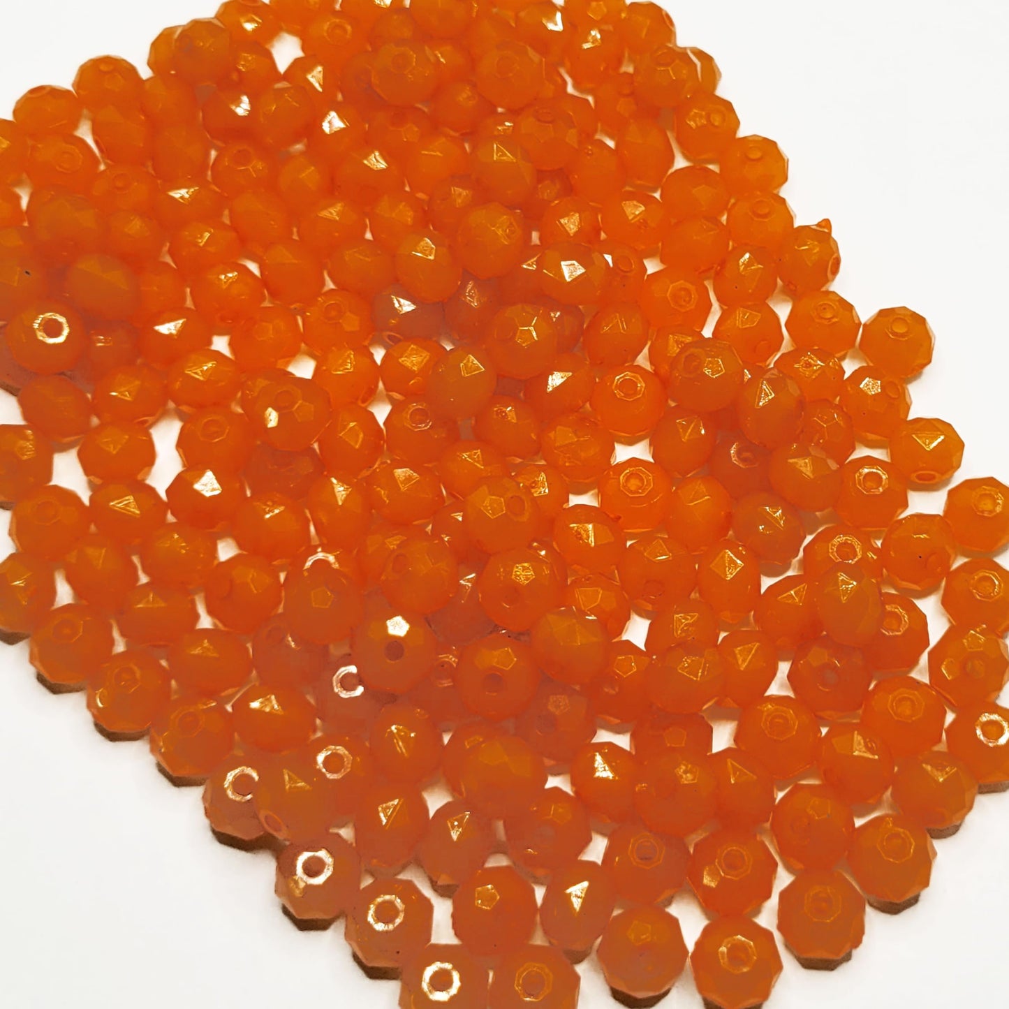 Orange 8mm beads help add a clean decorative look to bracelet making, necklace making and DIY jewellery projects.