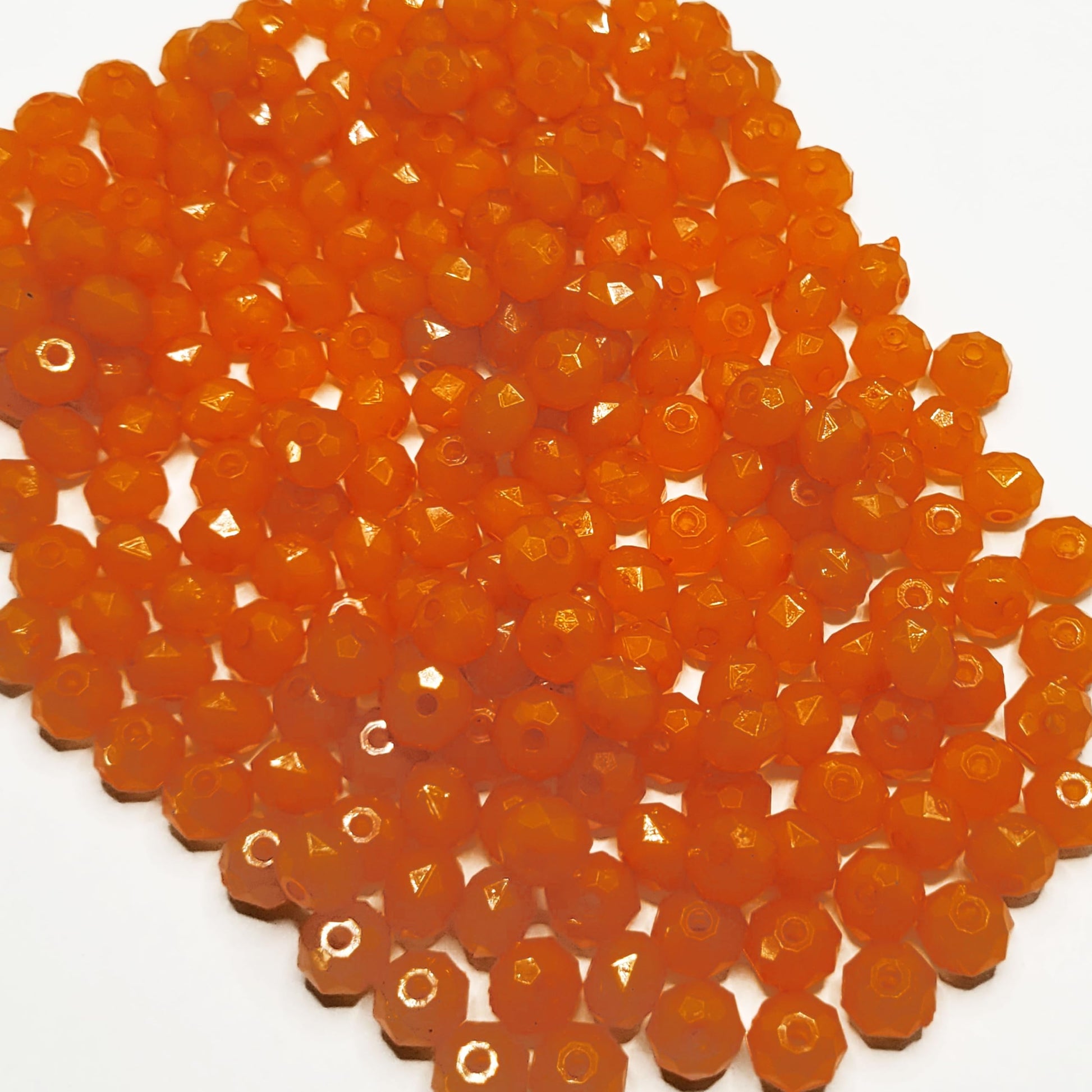 Orange 8mm beads help add a clean decorative look to bracelet making, necklace making and DIY jewellery projects.