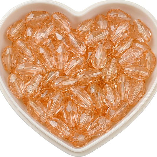 Add graceful dangle accents to earrings and charms with 10x6mm peach faceted teardrop beads.