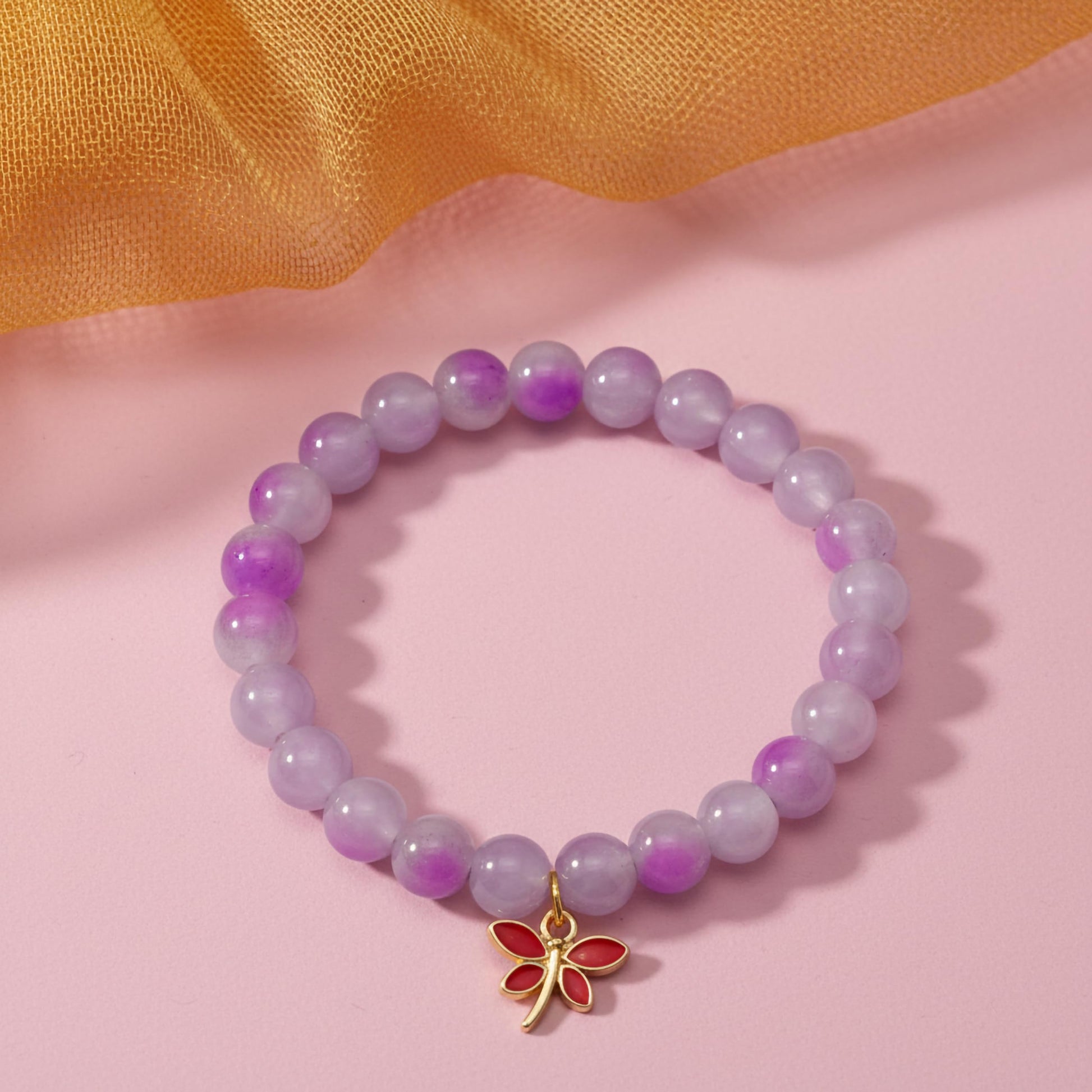 Bring color-block charm to casual outfits with a lavender stretch bracelet for girls and women.