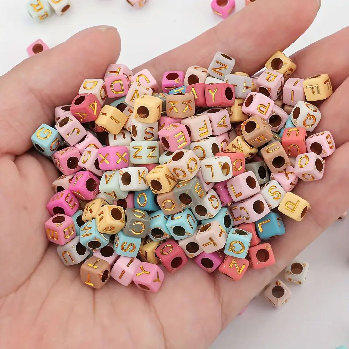 Gold Multicolor Alphabet Letter Cube 6mm. Detailed image showing material, texture, and design.