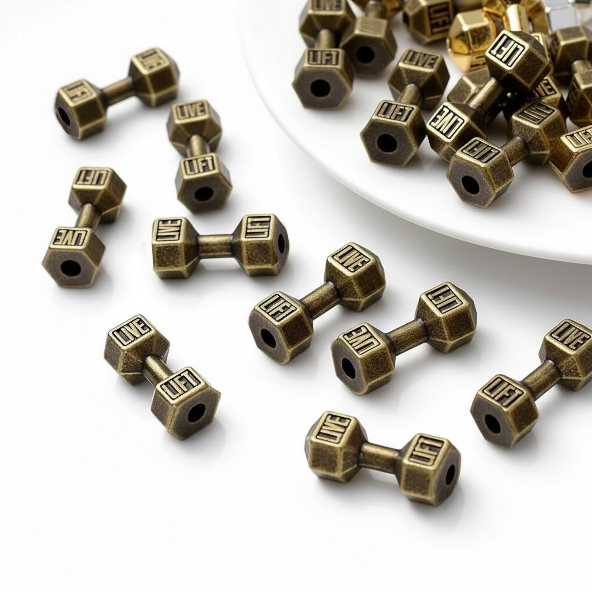 Style keychains and fitness jewelry with gold tone mini sport charms and a neat craft finish.
