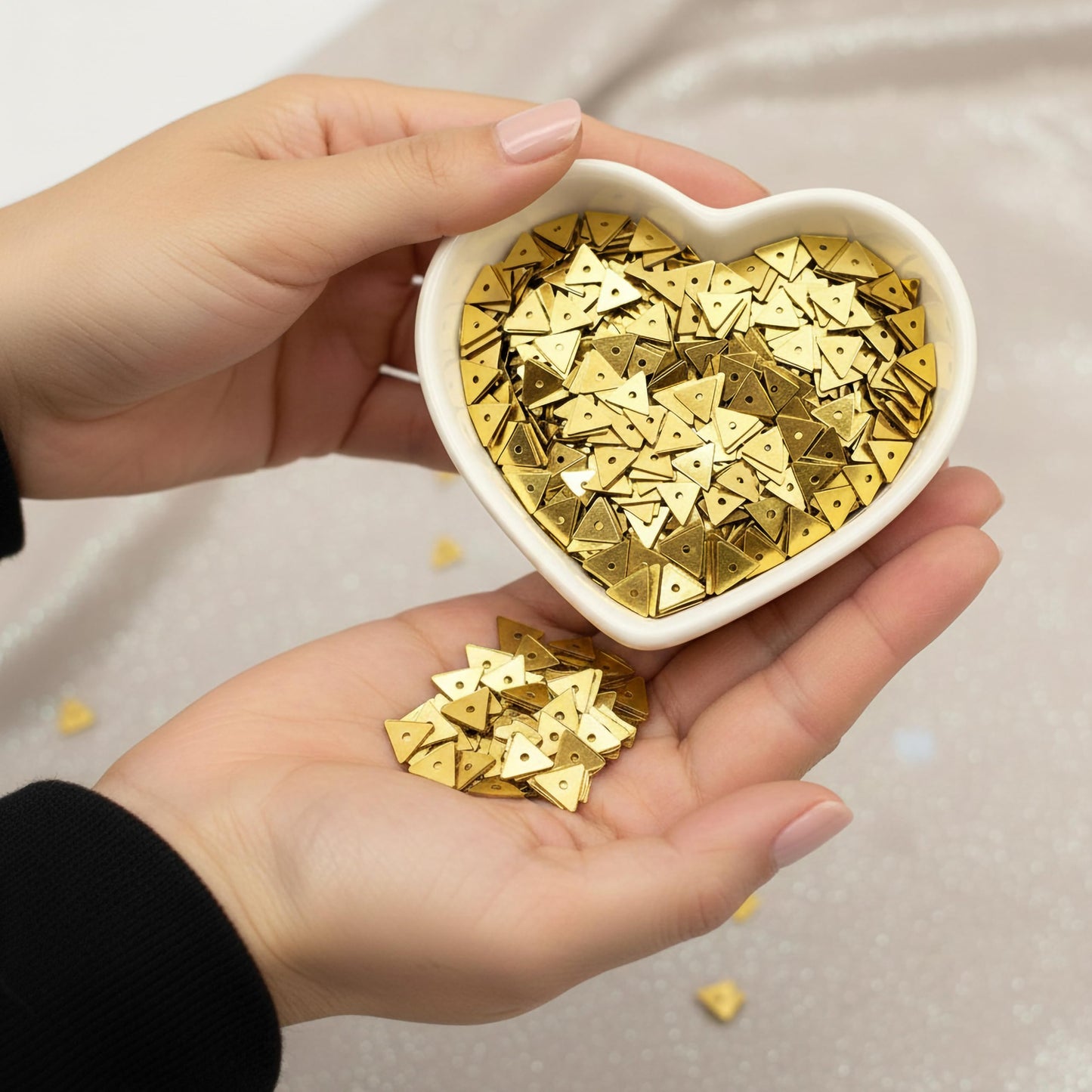 Give handmade boutique craft projects a fresh accent through festive gold triangle embroidery sequins.